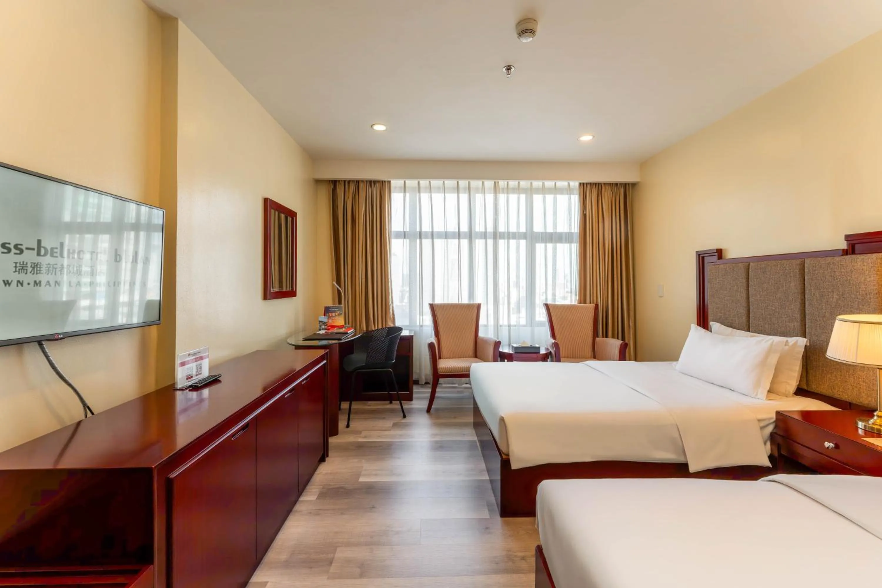 Photo of the whole room, Bed in Swiss-Belhotel Blulane