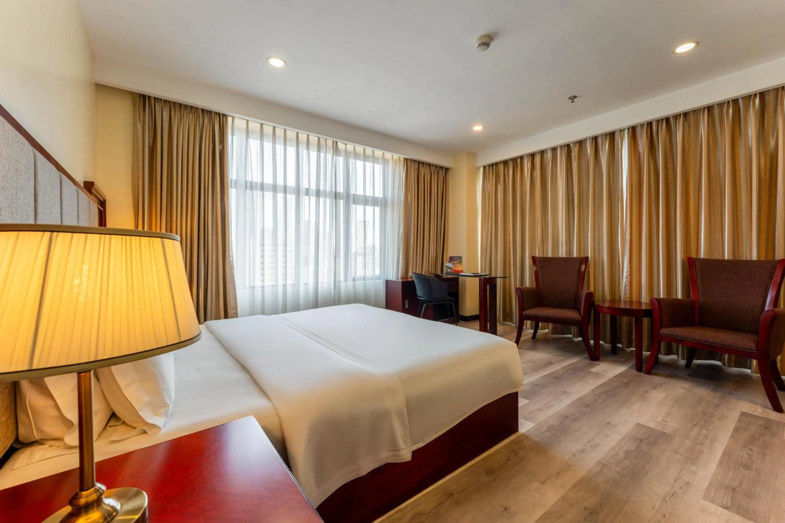 Photo of the whole room, Bed in Swiss-Belhotel Blulane