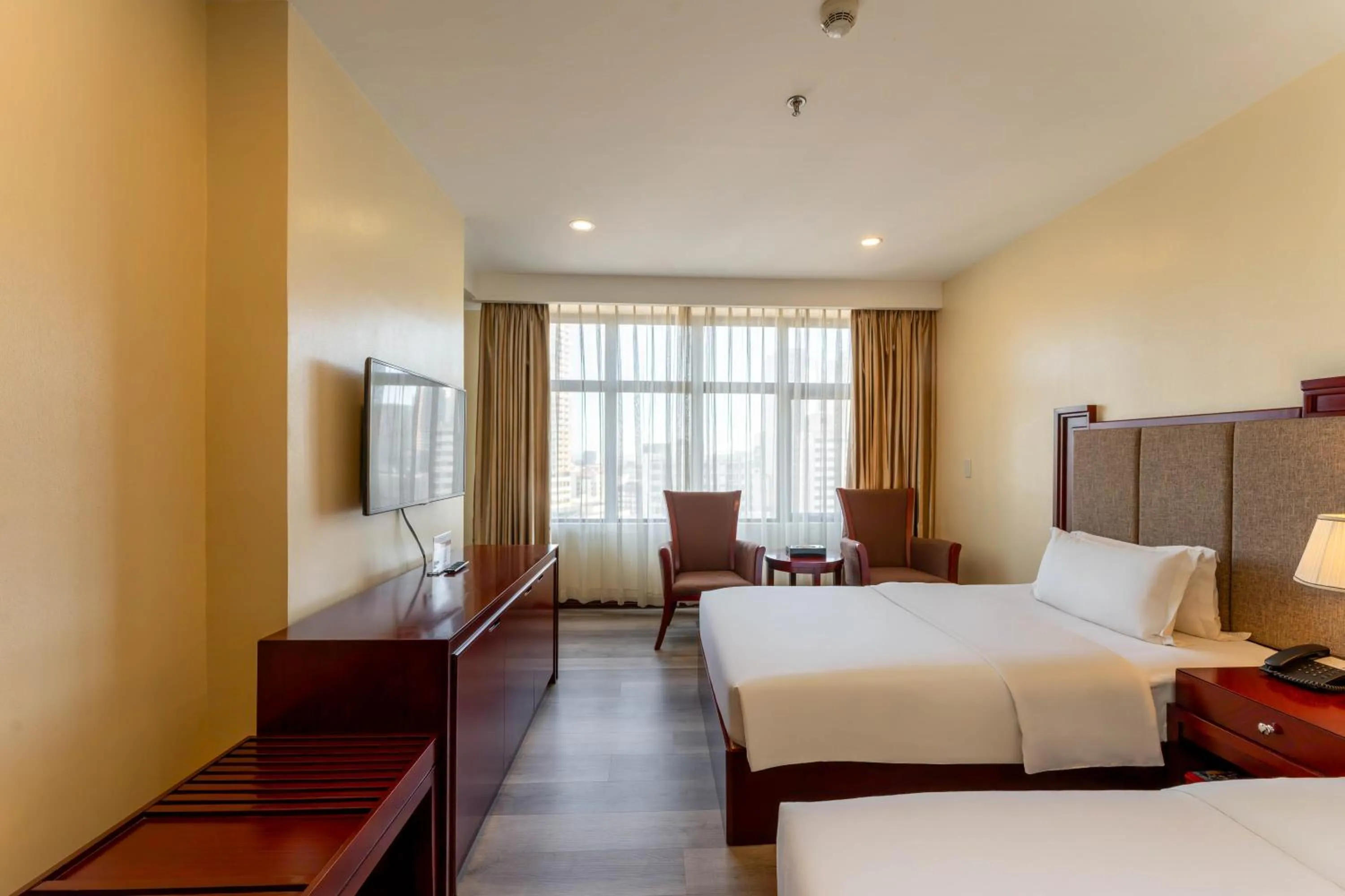 Photo of the whole room, Bed in Swiss-Belhotel Blulane