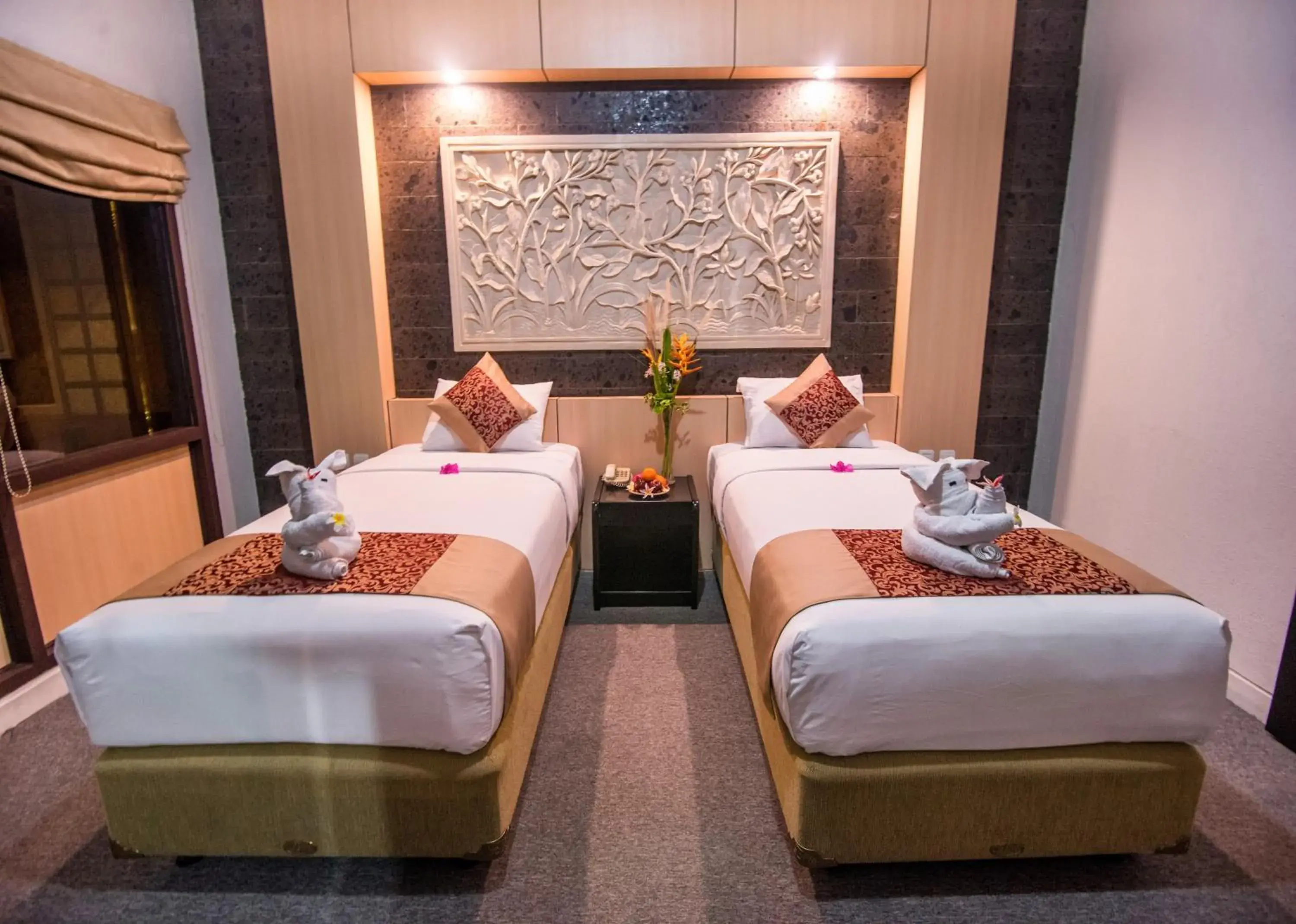 Bed in Nugraha Lovina Seaview Resort & Spa Bed in Nugraha Lovina Seaview Resort & Spa