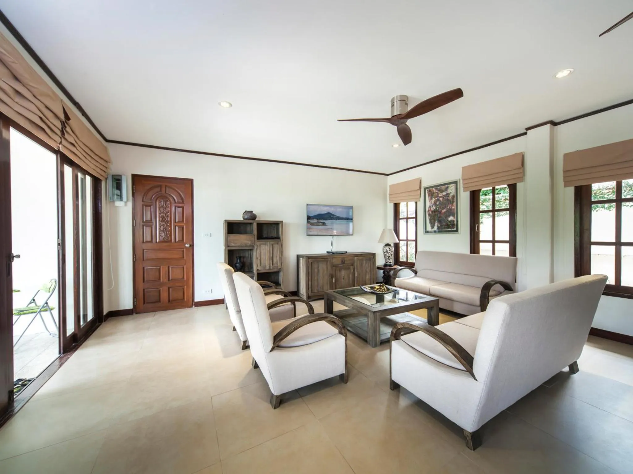 Communal lounge/ TV room in Idyllic Samui Beach Villa Resort