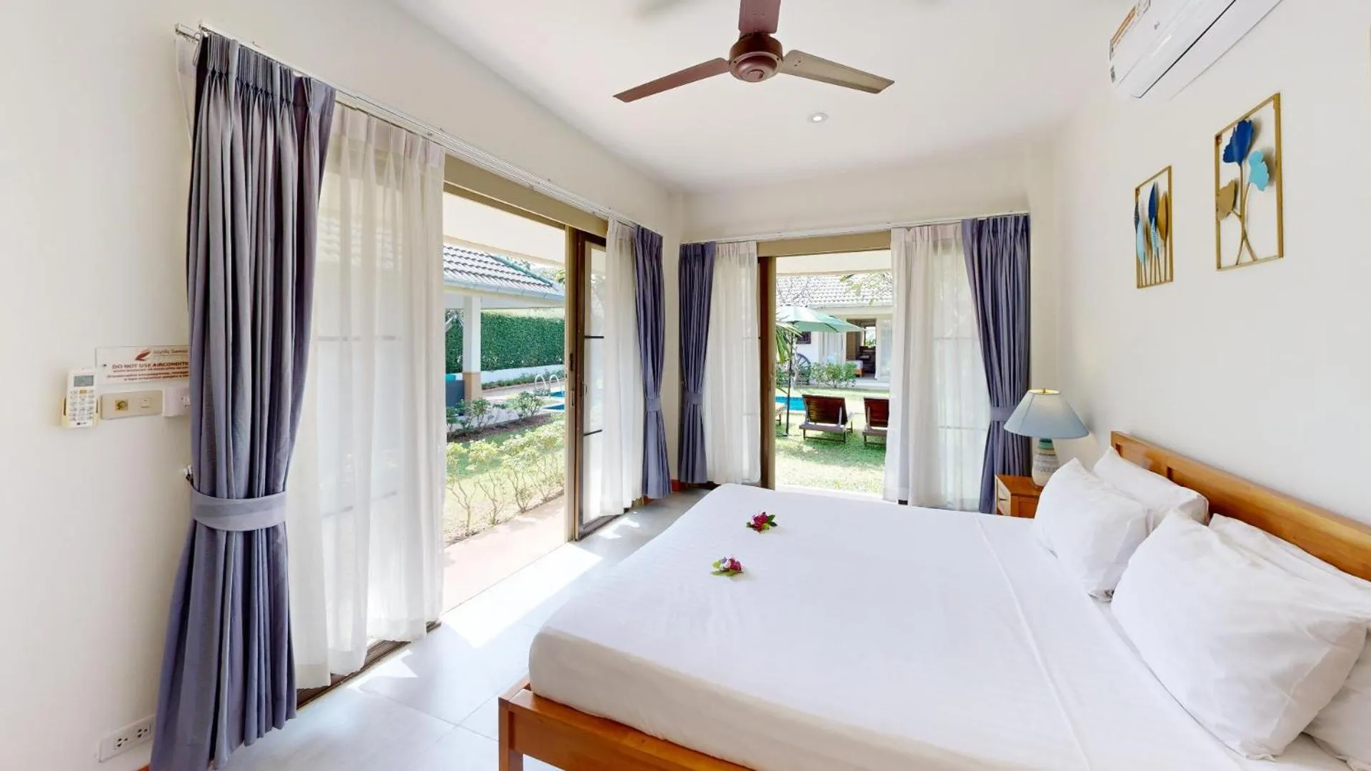Bed in Idyllic Samui Beach Villa Resort