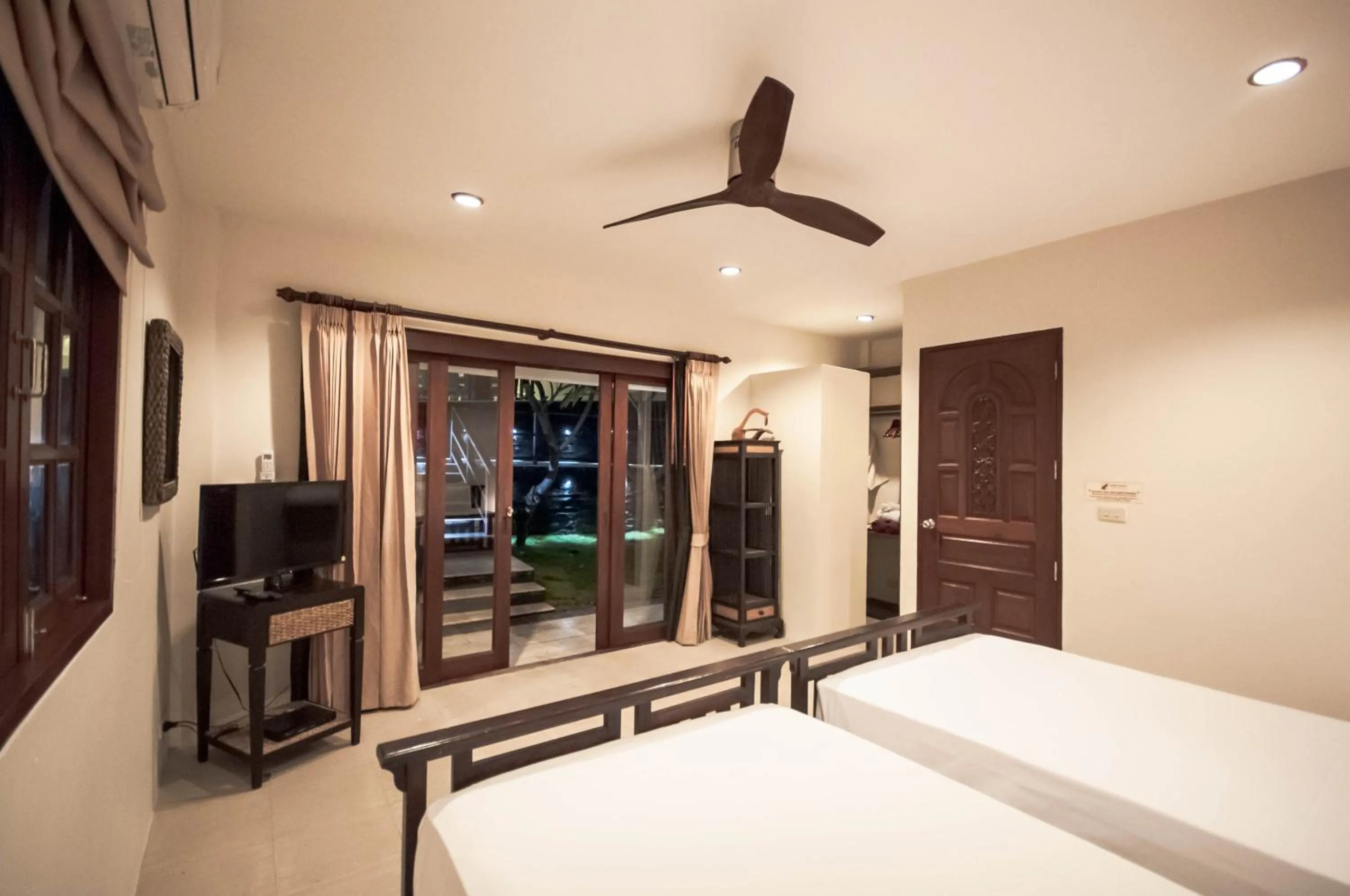 Bed in Idyllic Samui Beach Villa Resort