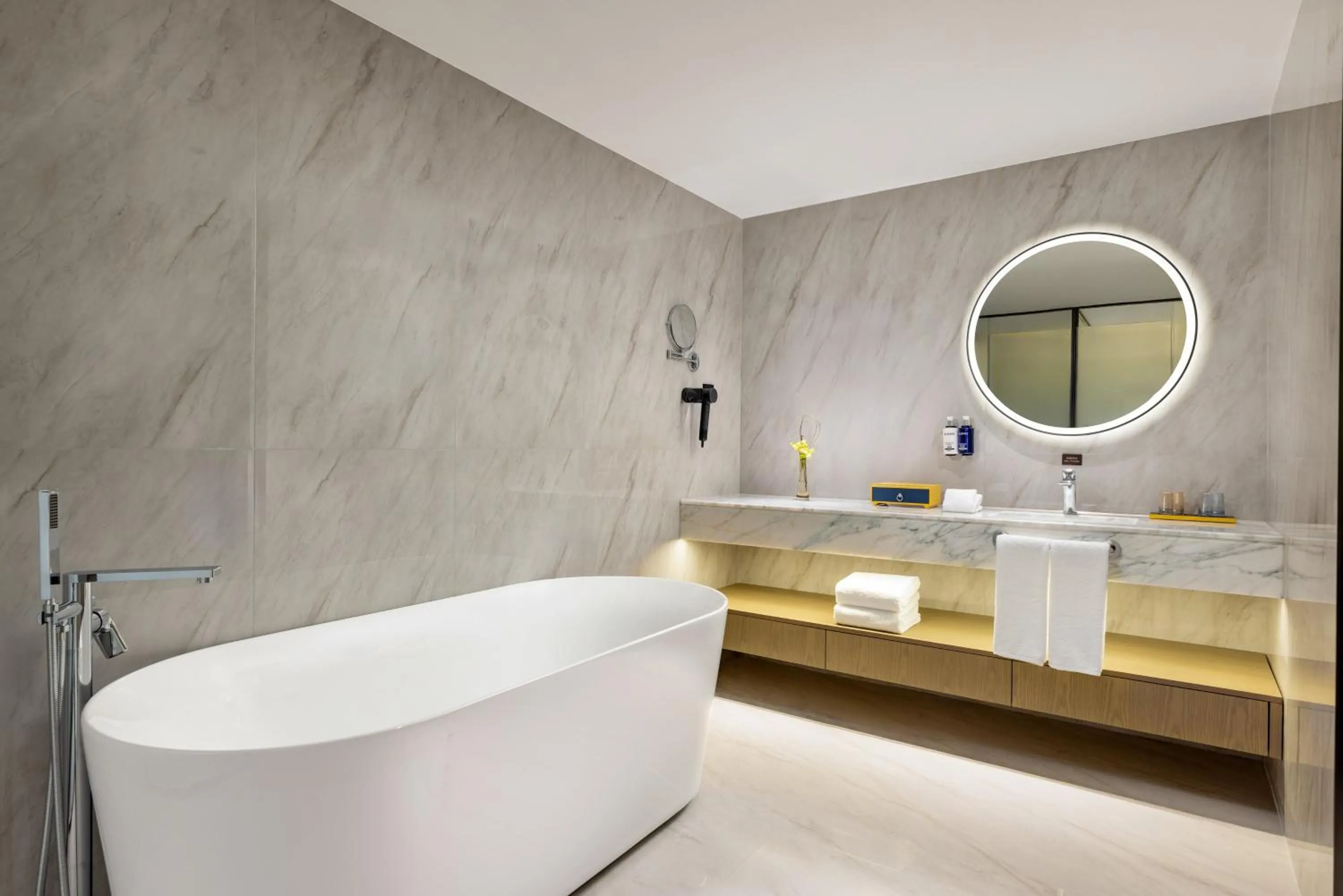 Bathroom in voco Suzhou Guanqian Street by IHG