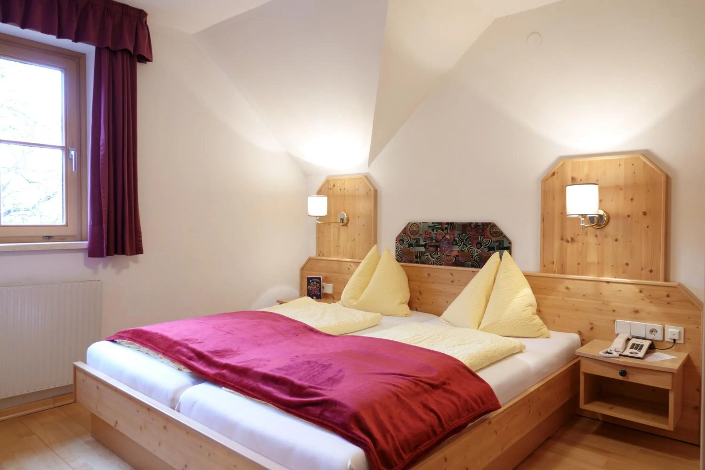 Bed in Hotel Malteinerhof