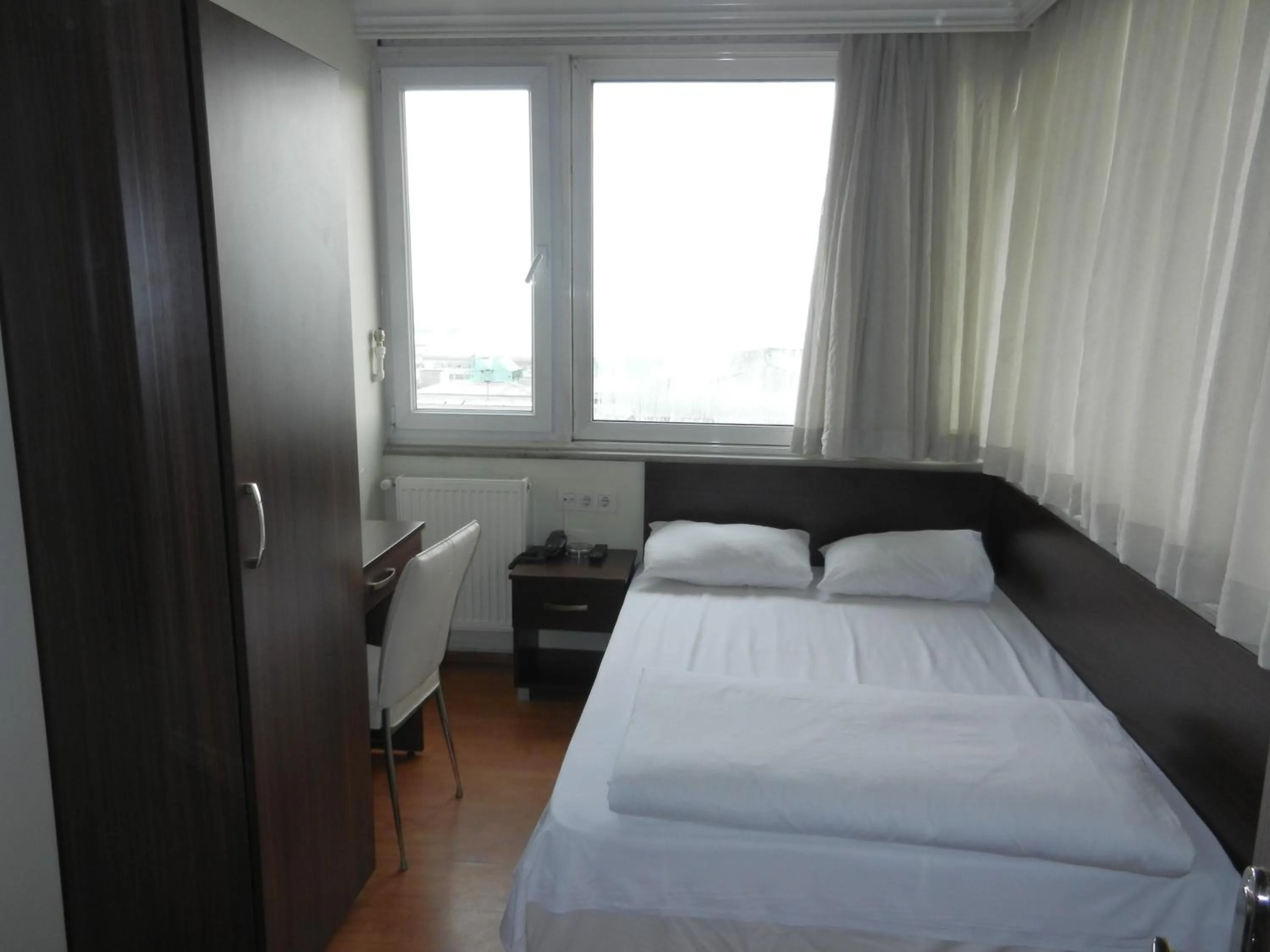 Photo of the whole room, Bed in Cagri Hotel