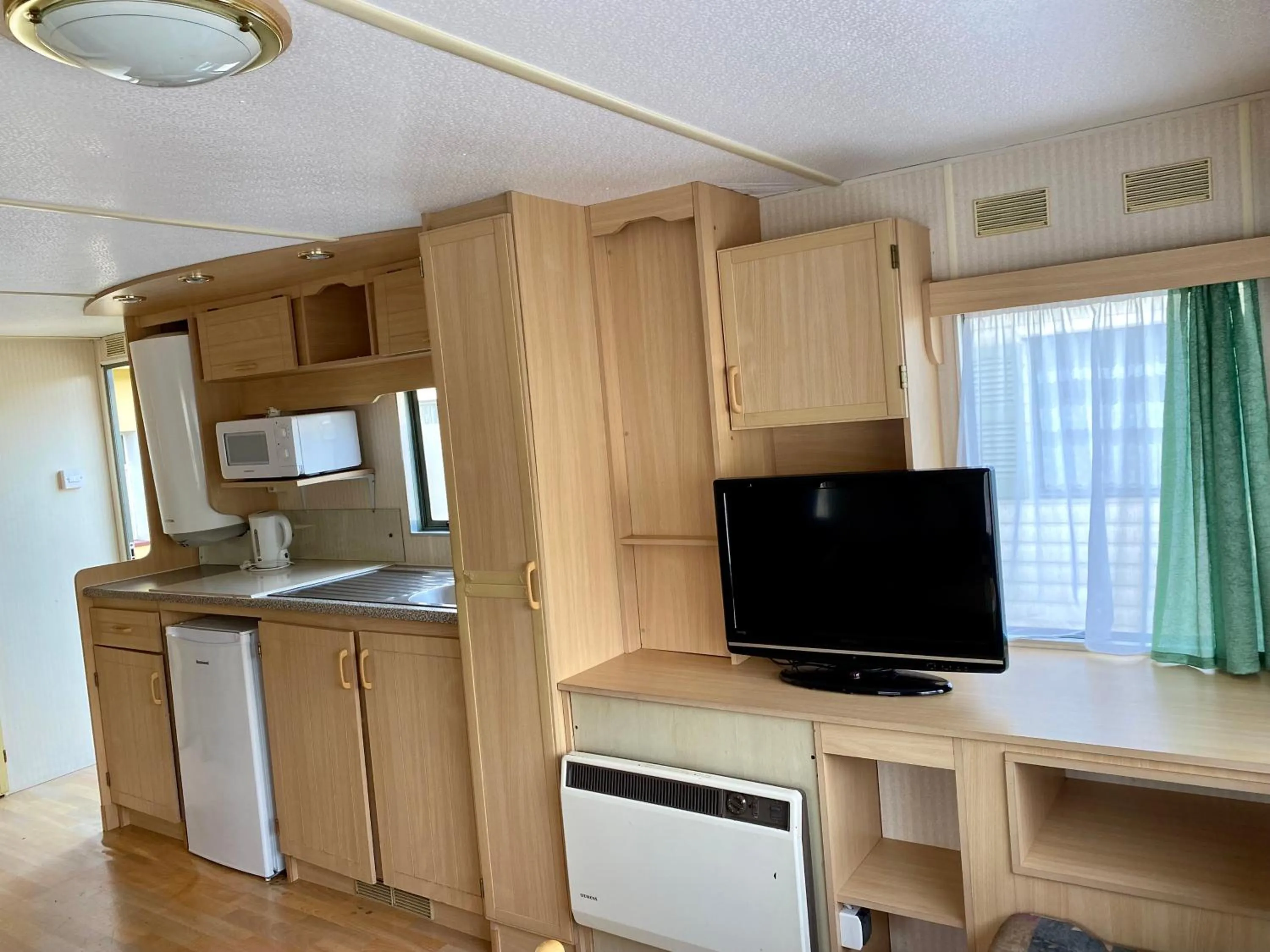 TV and multimedia in Domki Holenderskie Eden Resort & Spa