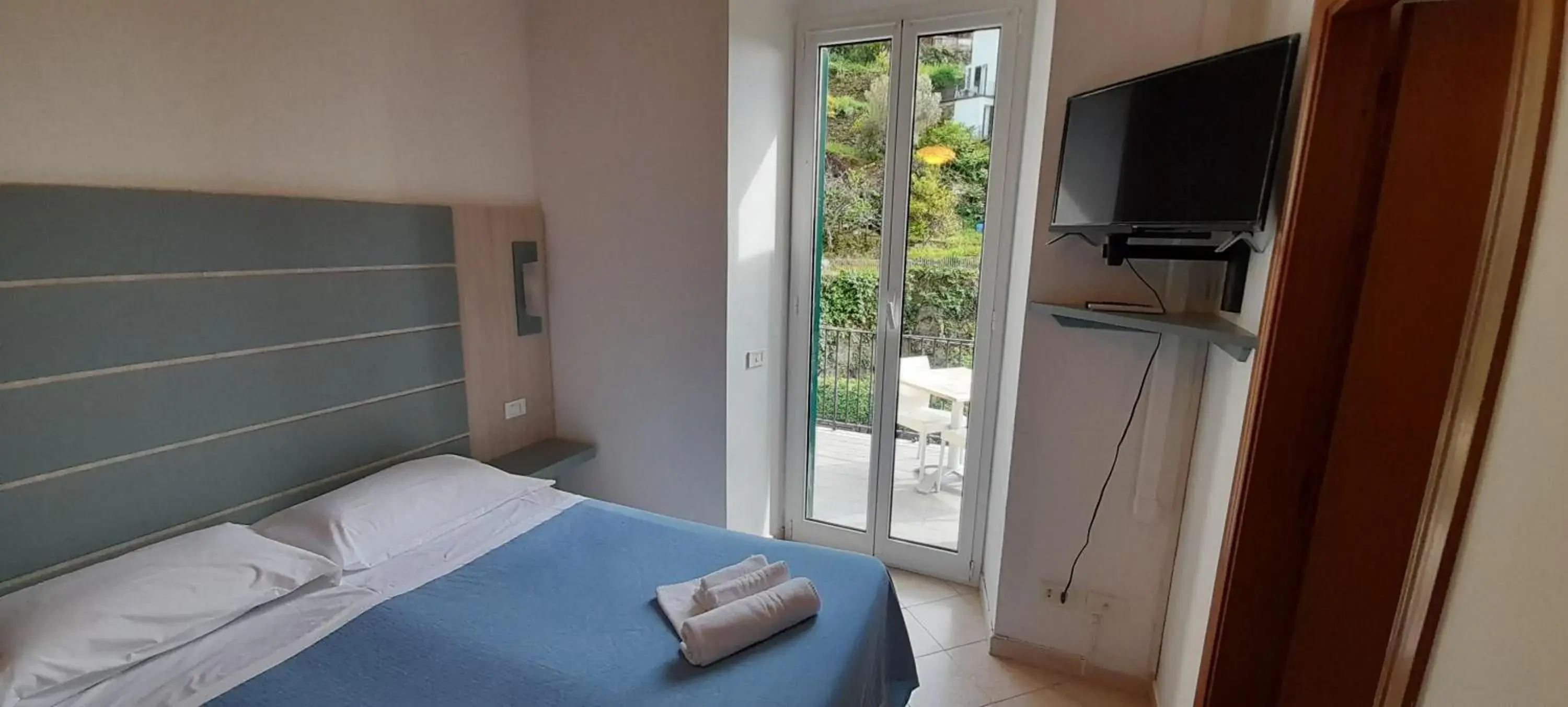 Bed in Hotel Villa Argentina Bed in Hotel Villa Argentina