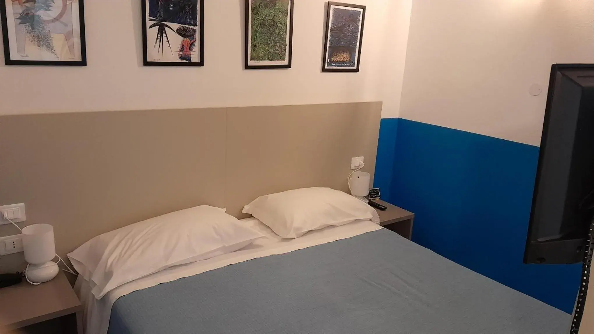 Bed in Hotel Villa Argentina Bed in Hotel Villa Argentina