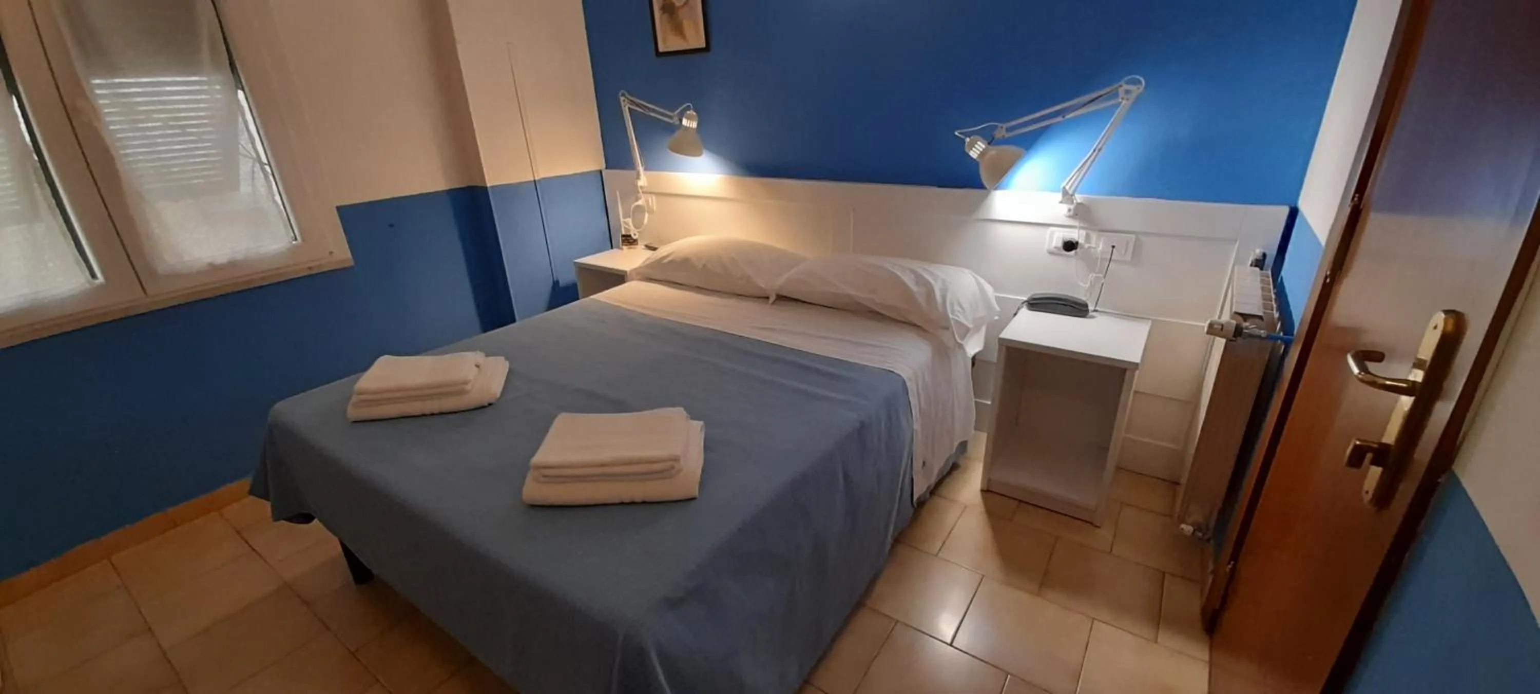 Bed in Hotel Villa Argentina