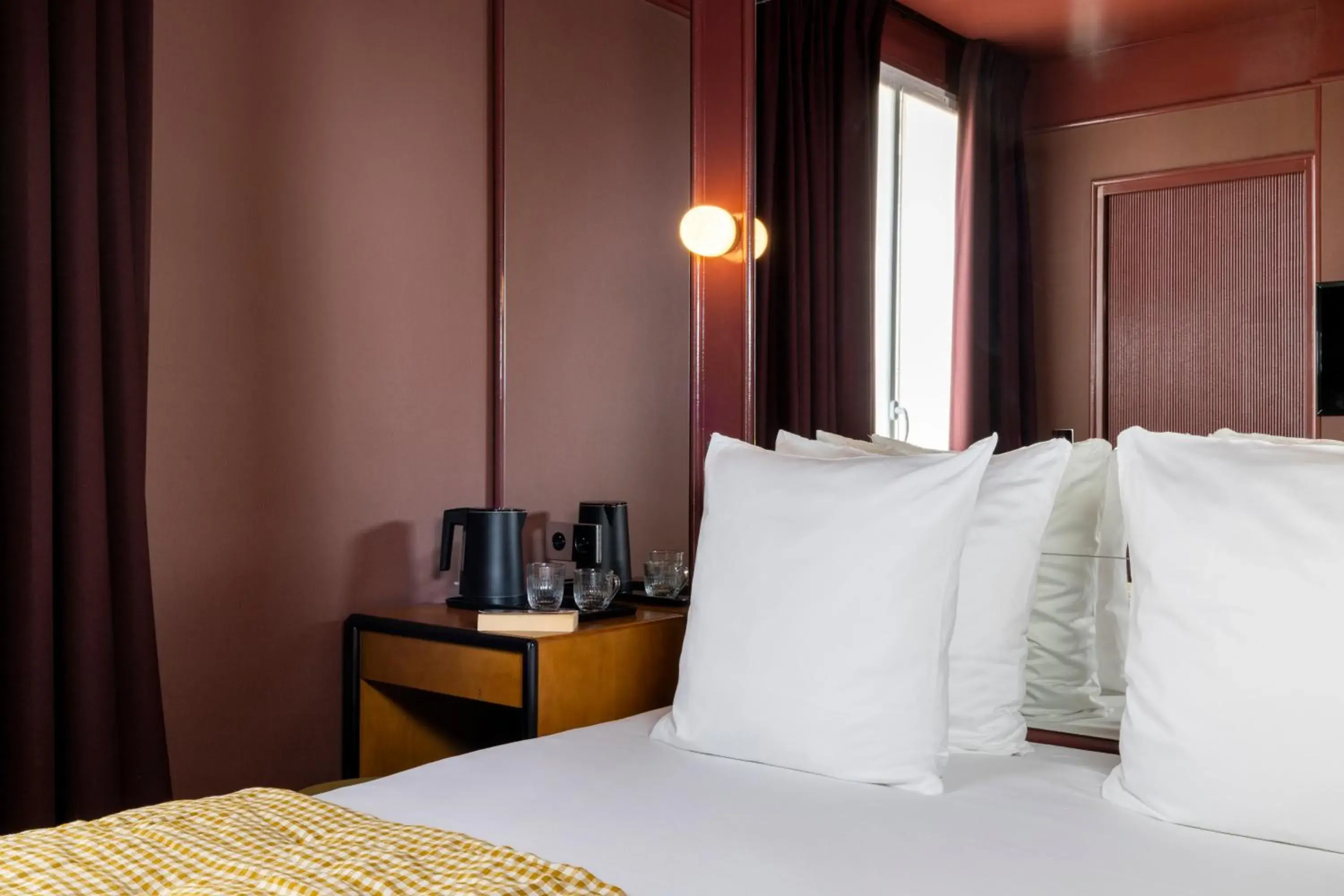 Bed in Hôtel La Conversation Bed in Hôtel La Conversation
