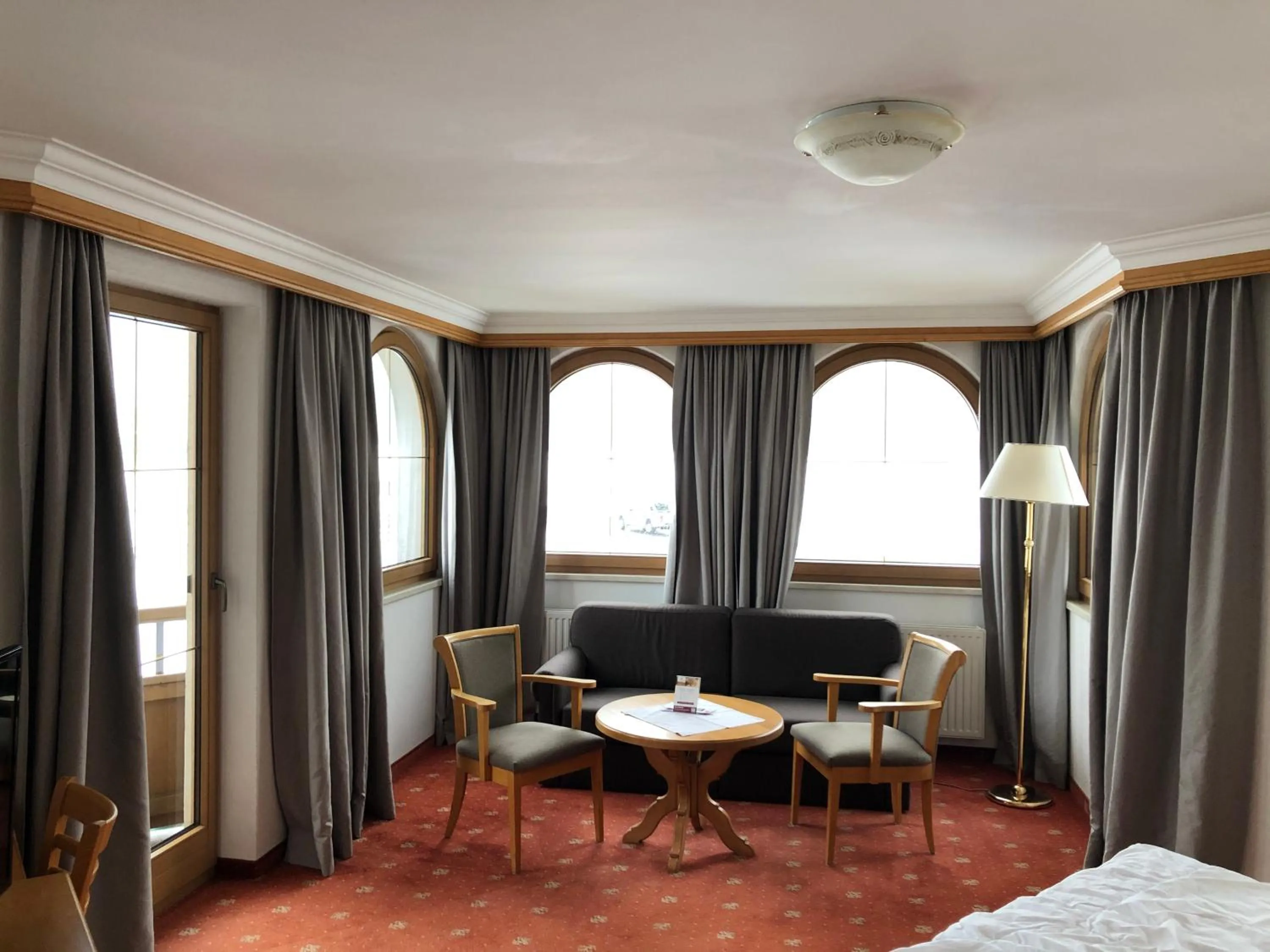 Living room, Bed in Landhotel Strasserwirt