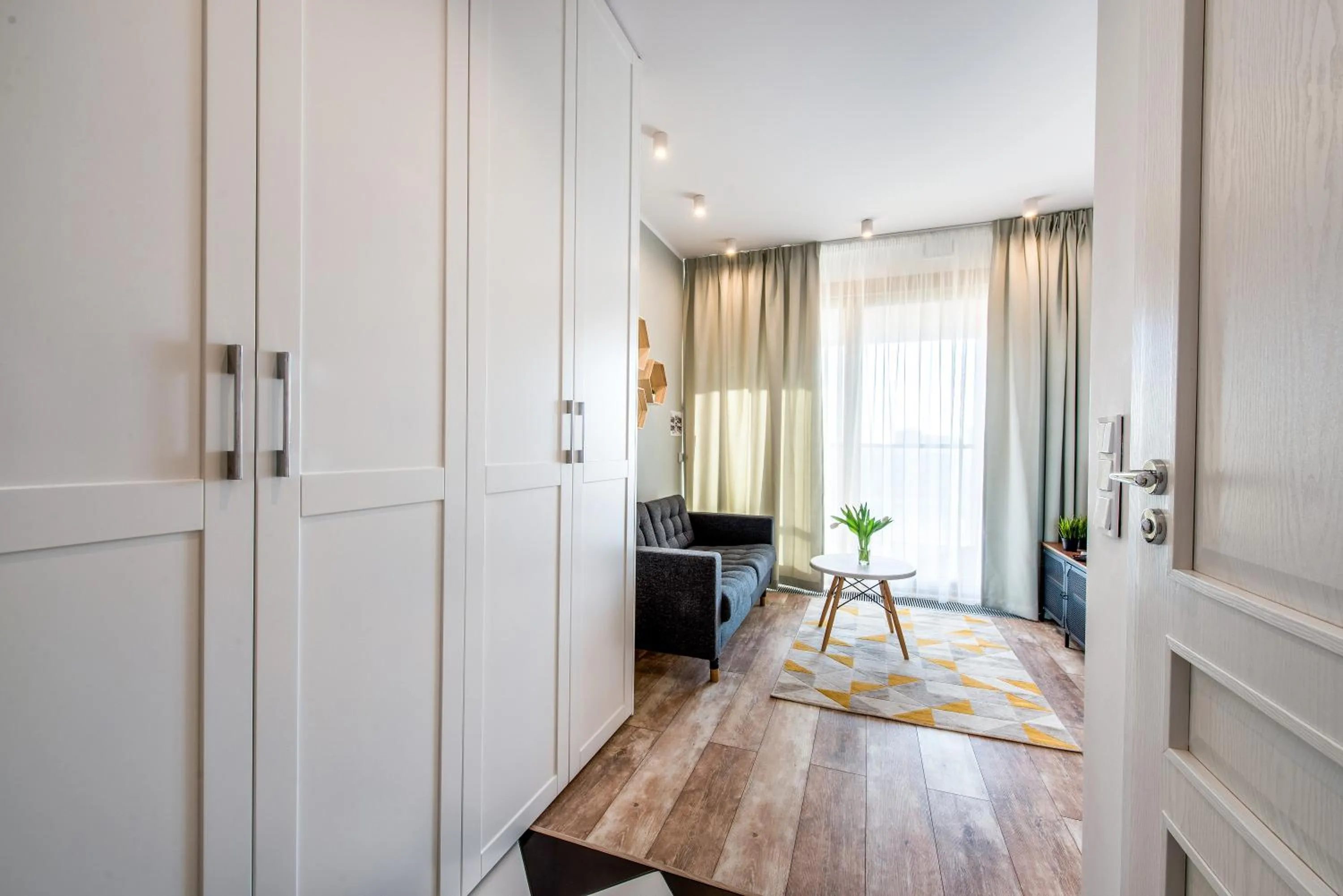 Seating area in ApartHotel Kolejowa Apartamenty