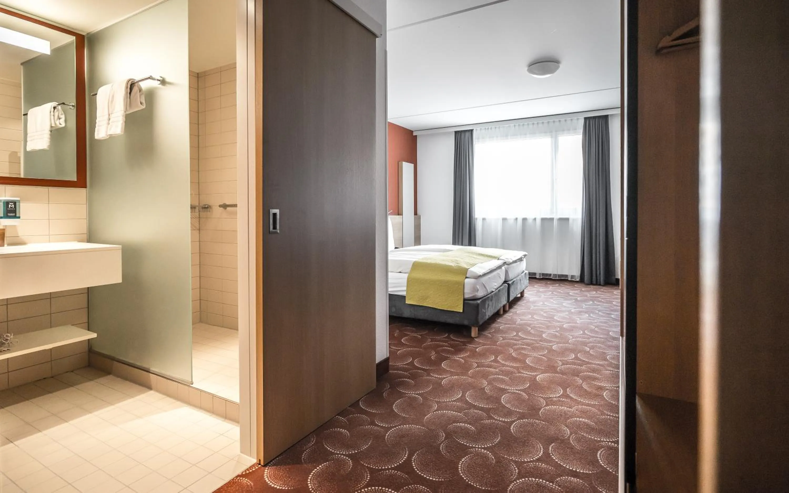 Bed in Hotel Ochsen 2 by Mountain Hotels