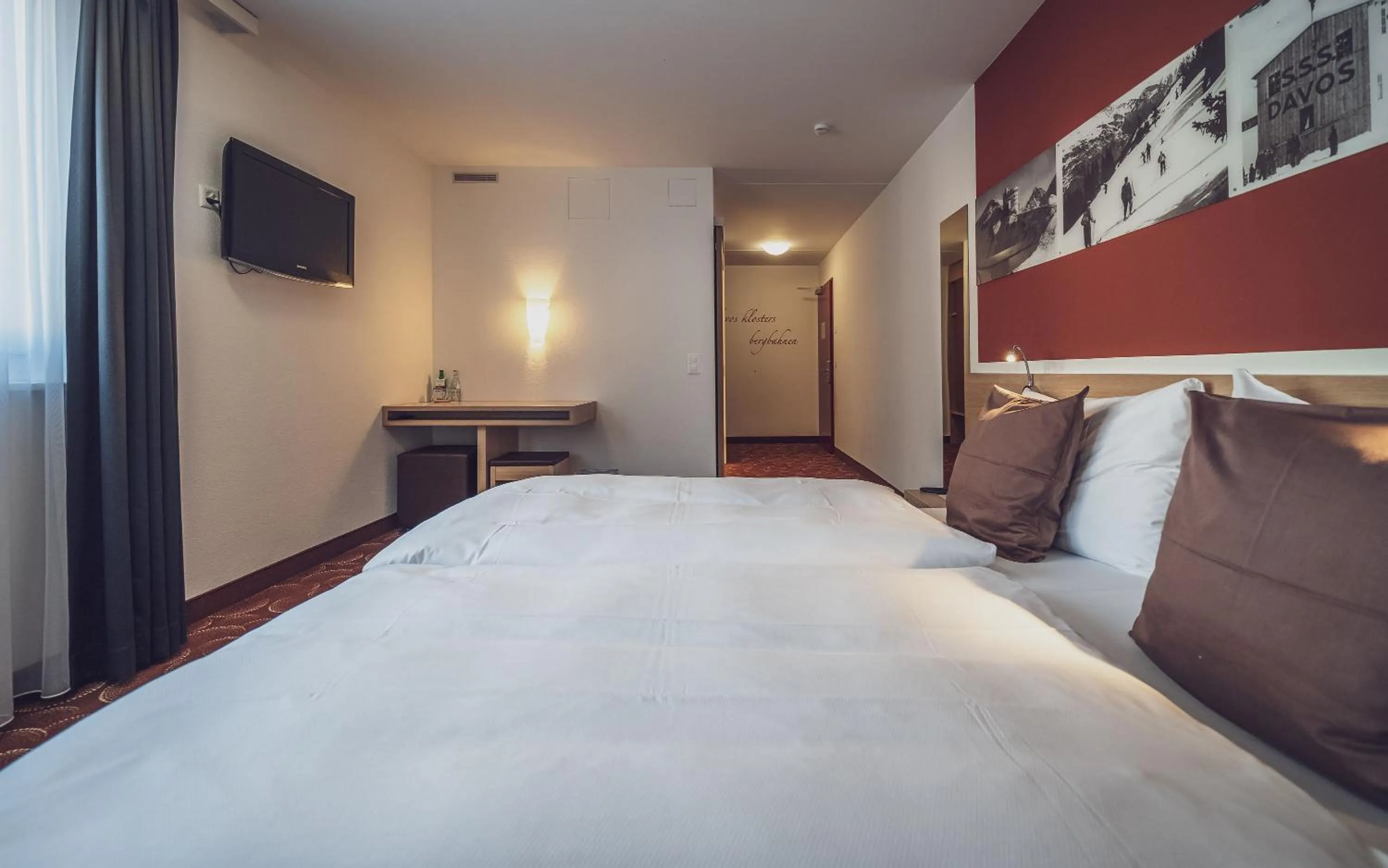 Photo of the whole room, Bed in Hotel Ochsen 2 by Mountain Hotels