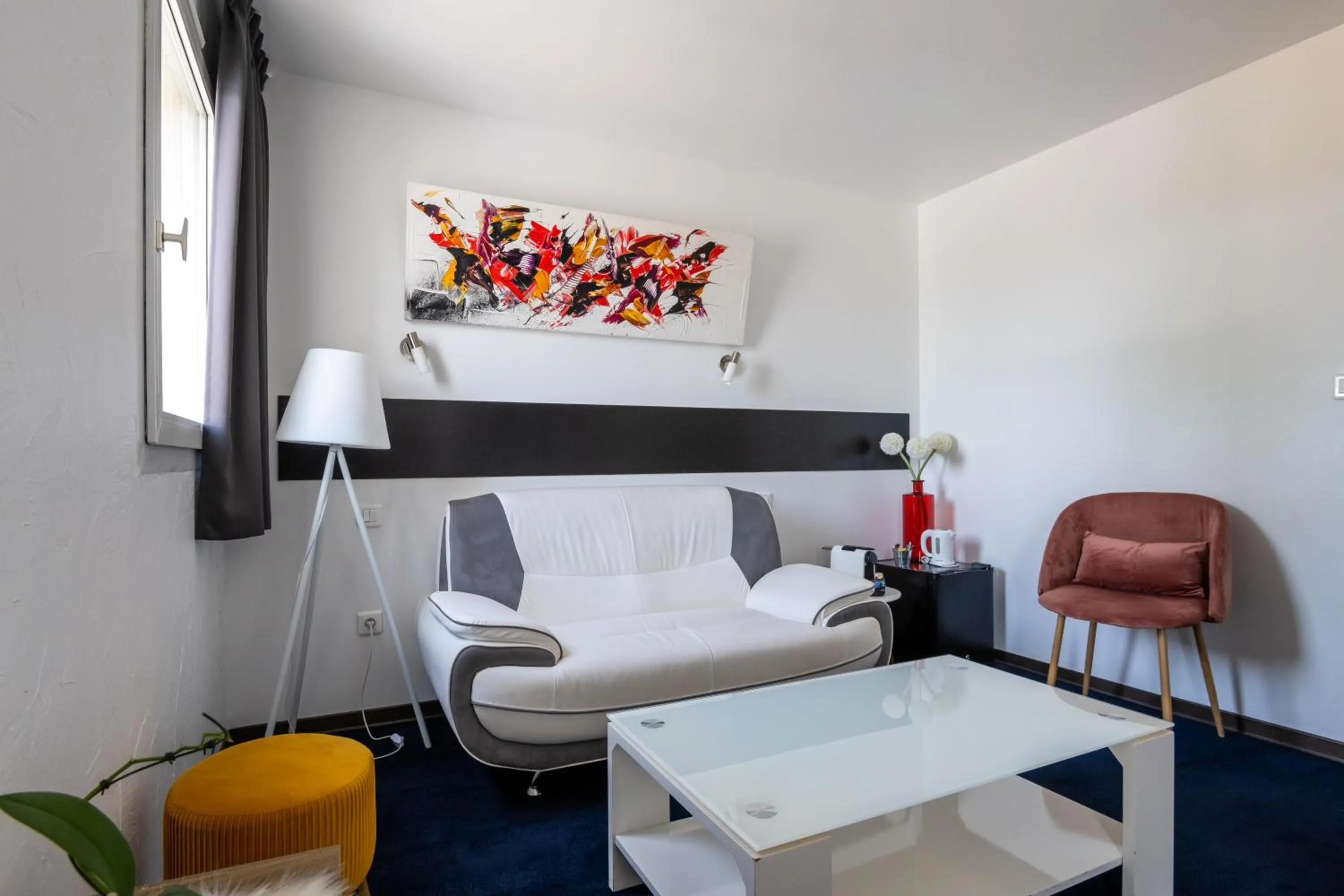 Bedroom in LOGIS Hôtel Restaurant Le Clos Fleuri