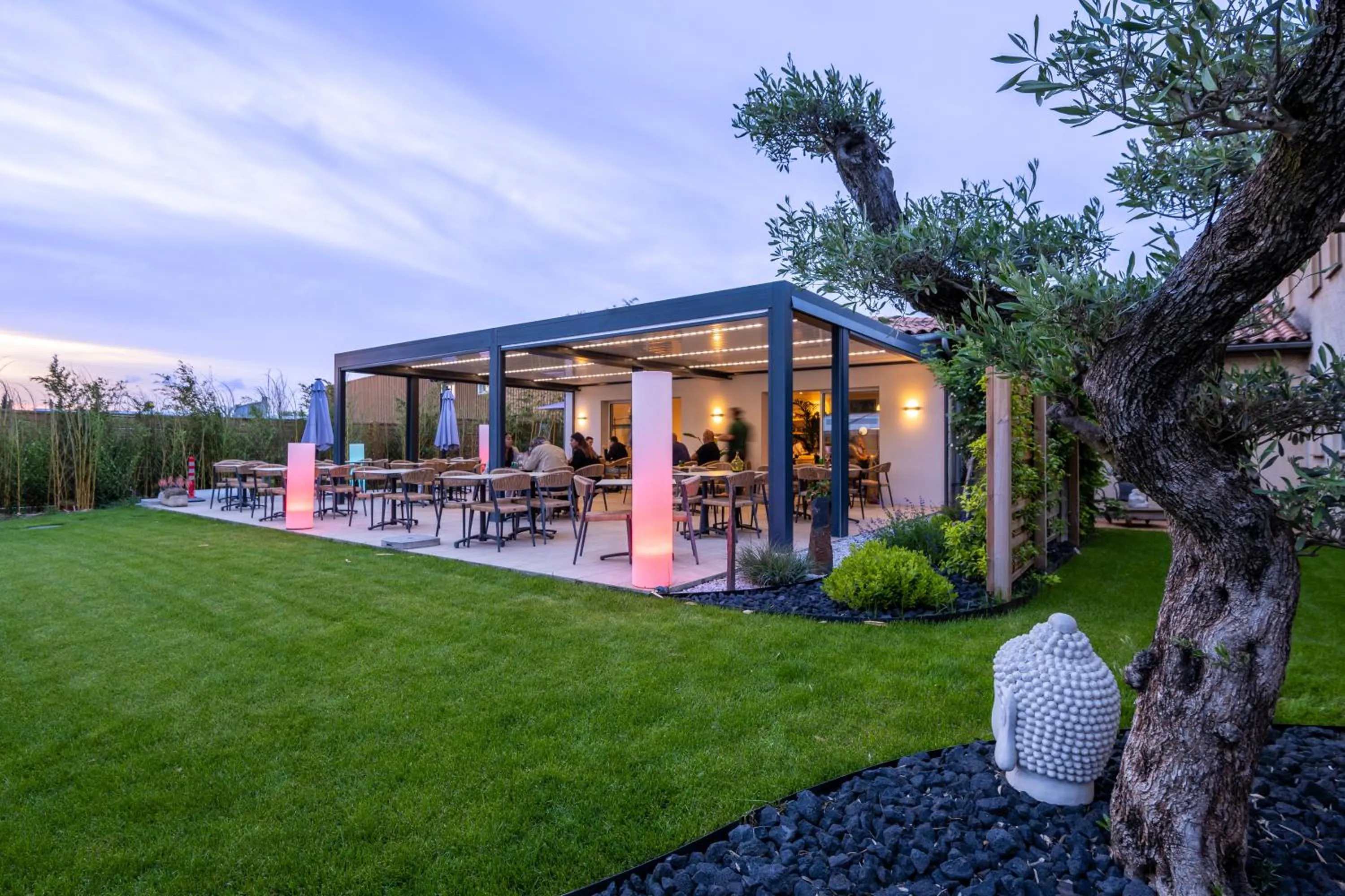 Patio in LOGIS Hôtel Restaurant Le Clos Fleuri