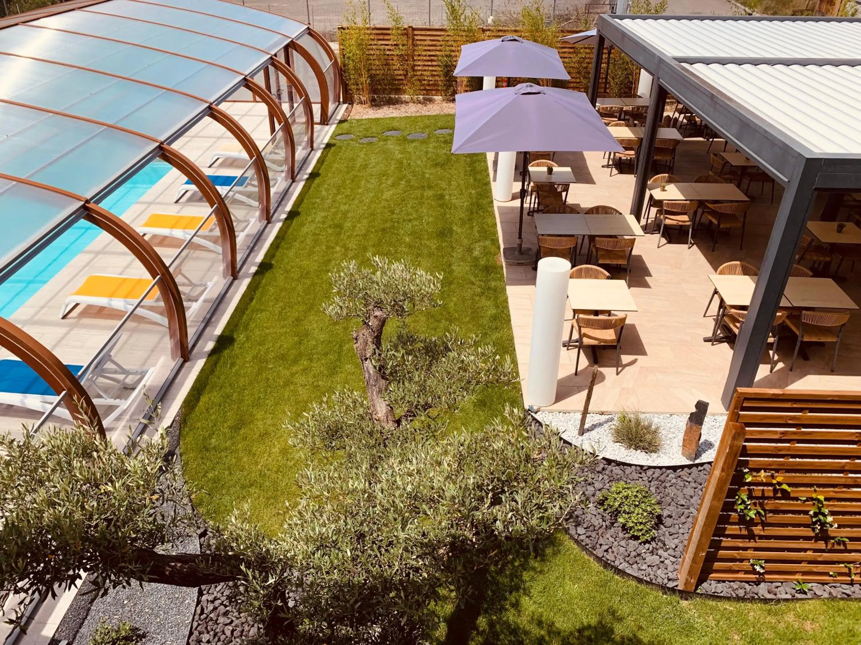 Patio in LOGIS Hôtel Restaurant Le Clos Fleuri