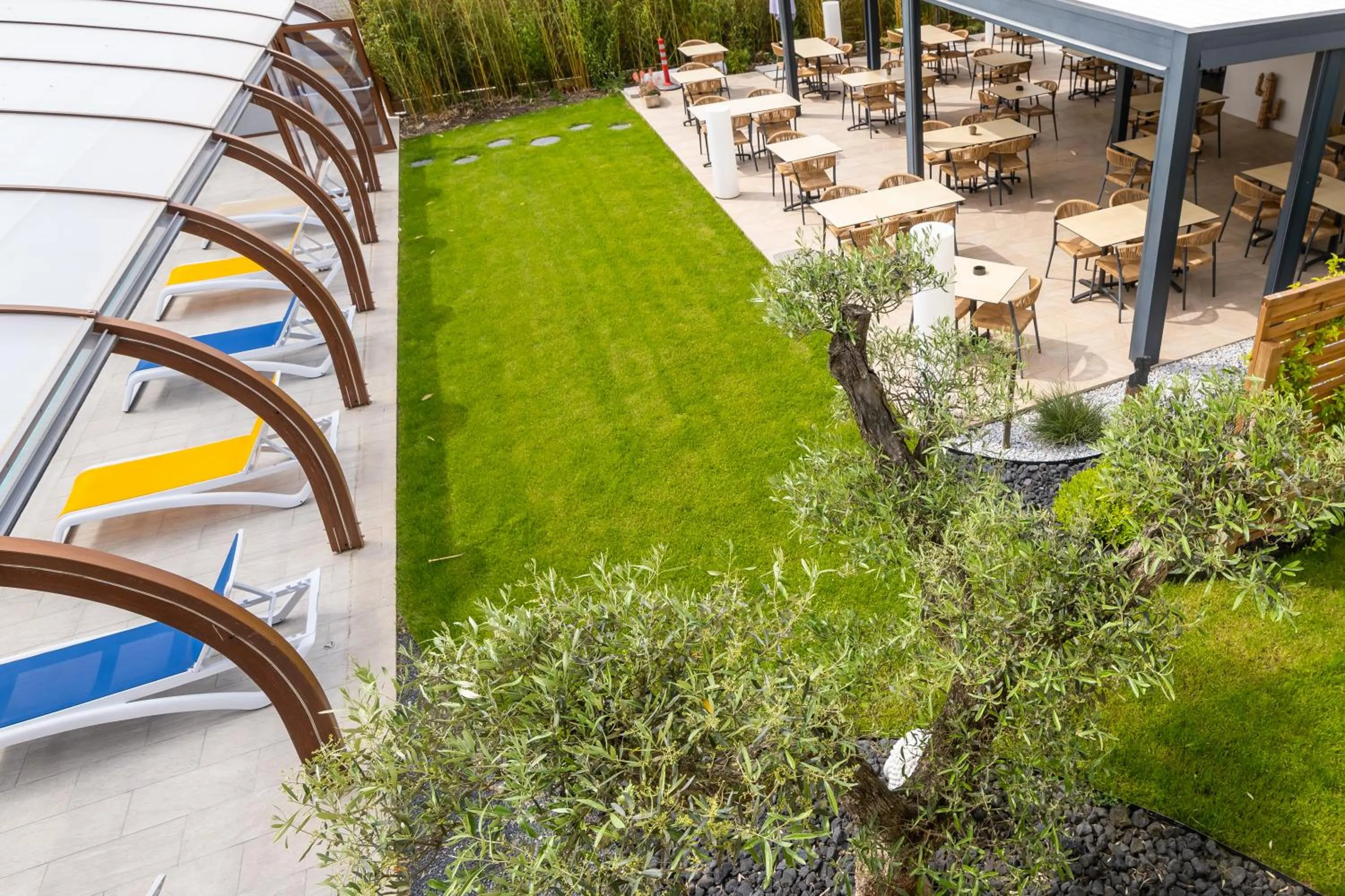 Patio in LOGIS Hôtel Restaurant Le Clos Fleuri