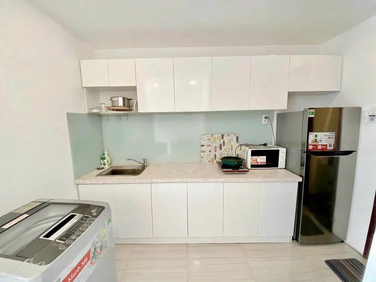 Kitchen or kitchenette in Grace Apartment - HCM