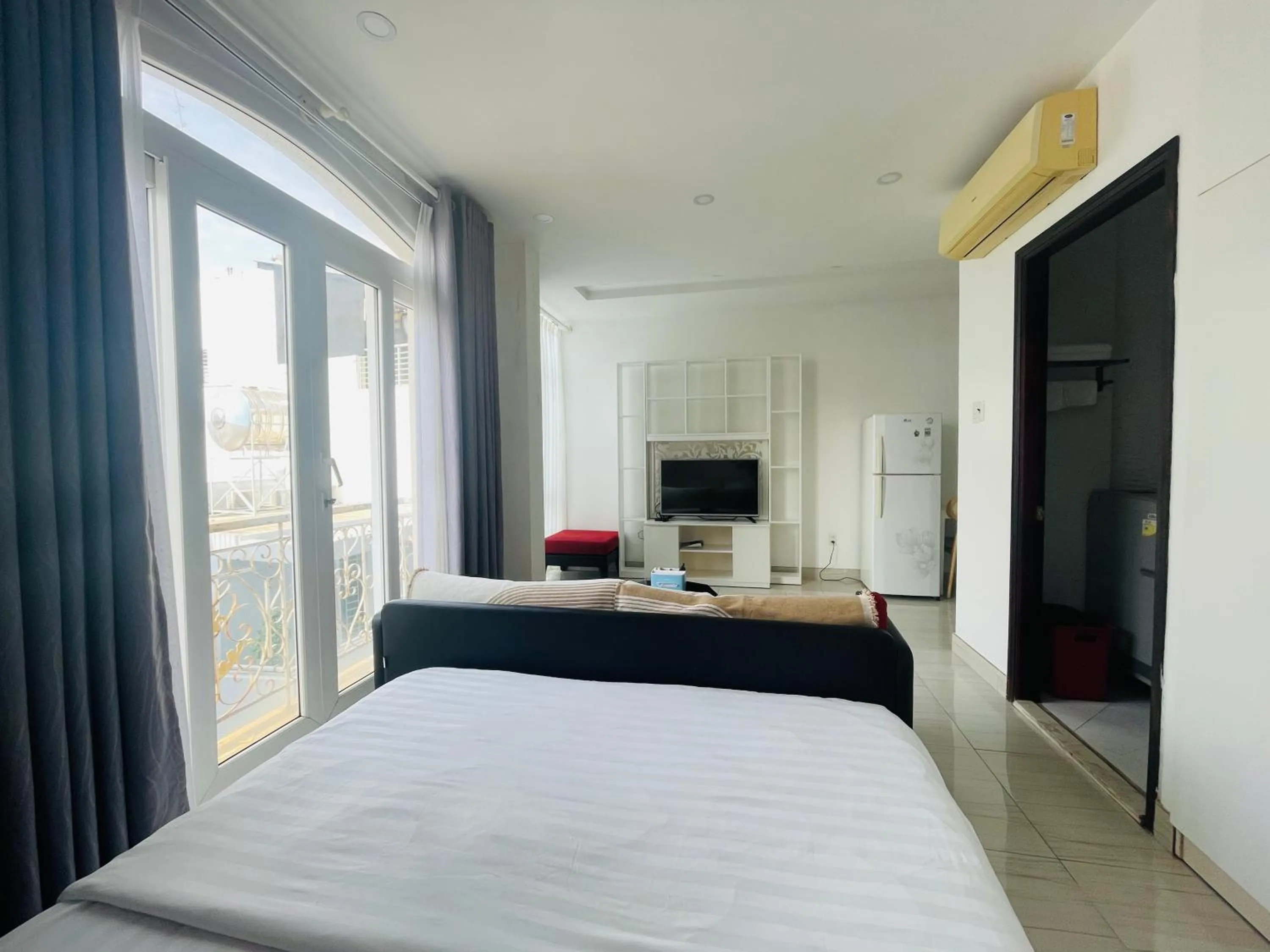 TV and multimedia, Bed in Grace Apartment - HCM