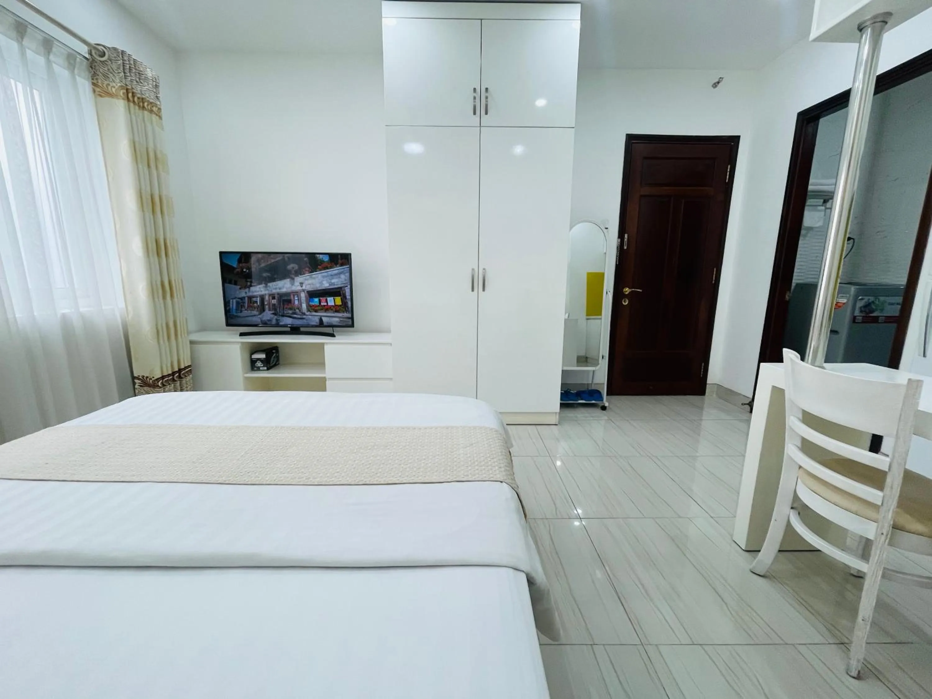 Photo of the whole room, Bed in Grace Apartment - HCM