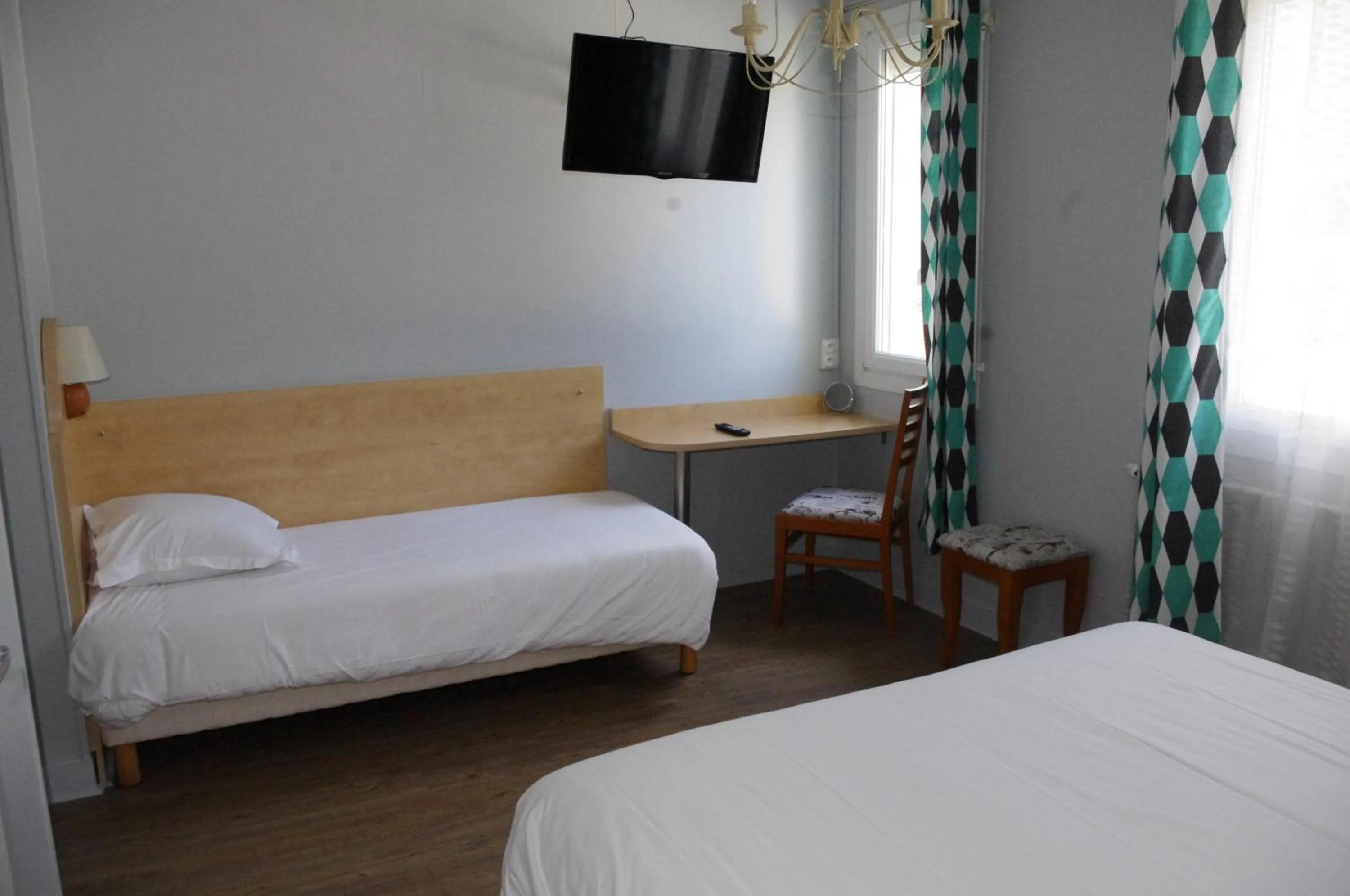 Bed in Hôtel De Paris