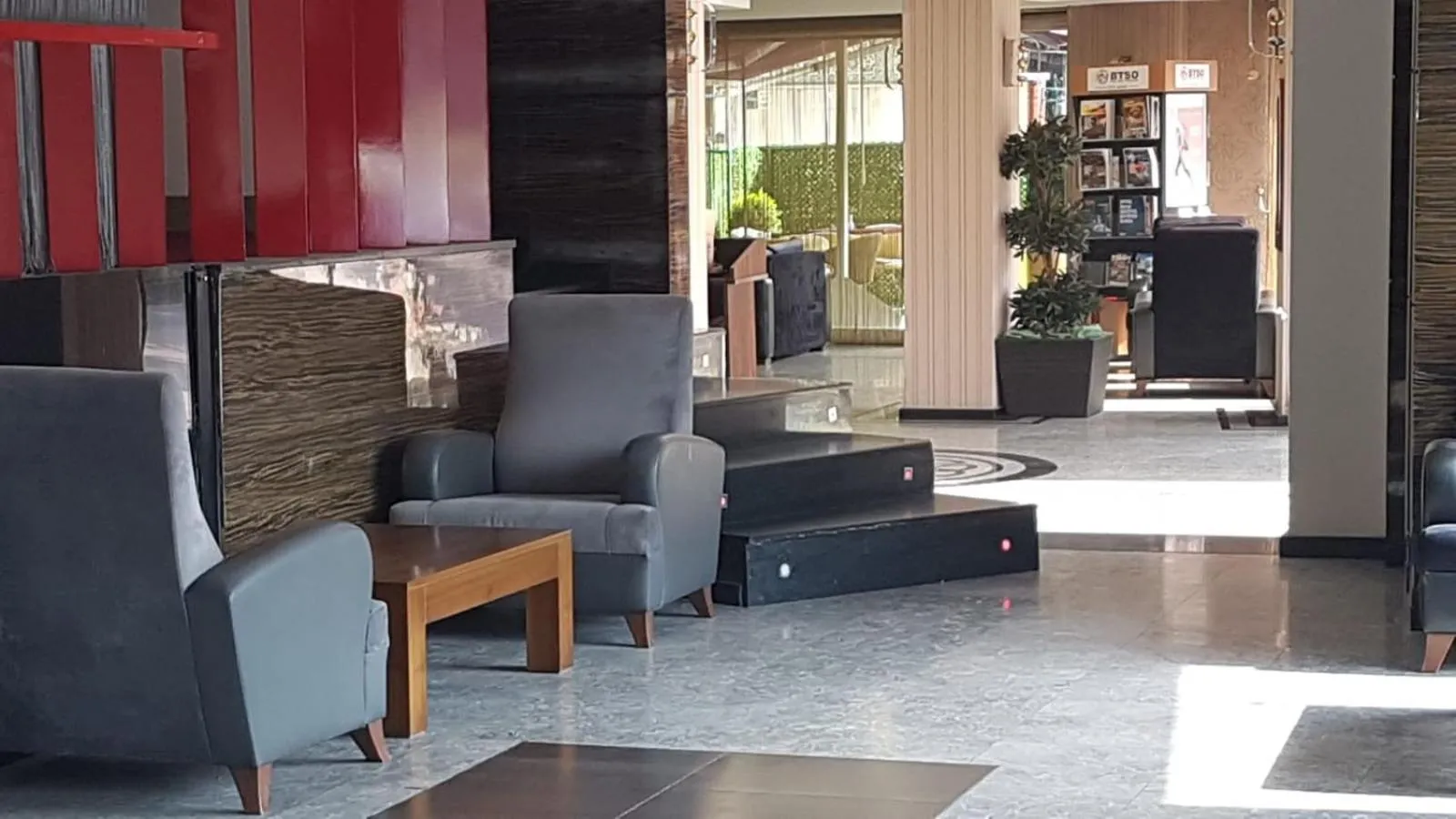 Communal lounge/ TV room in Lioncity Hotel