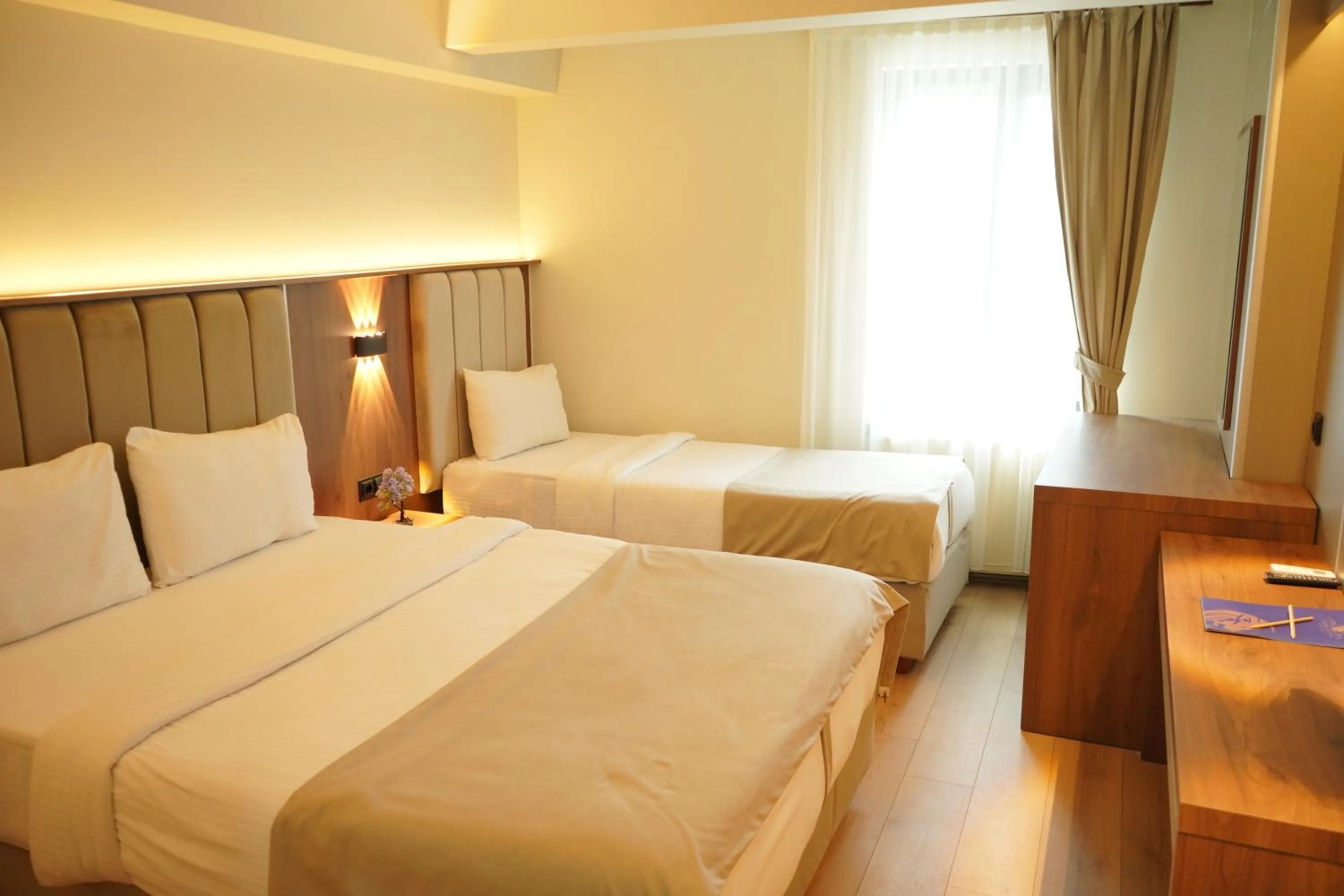 Bed in Lioncity Hotel