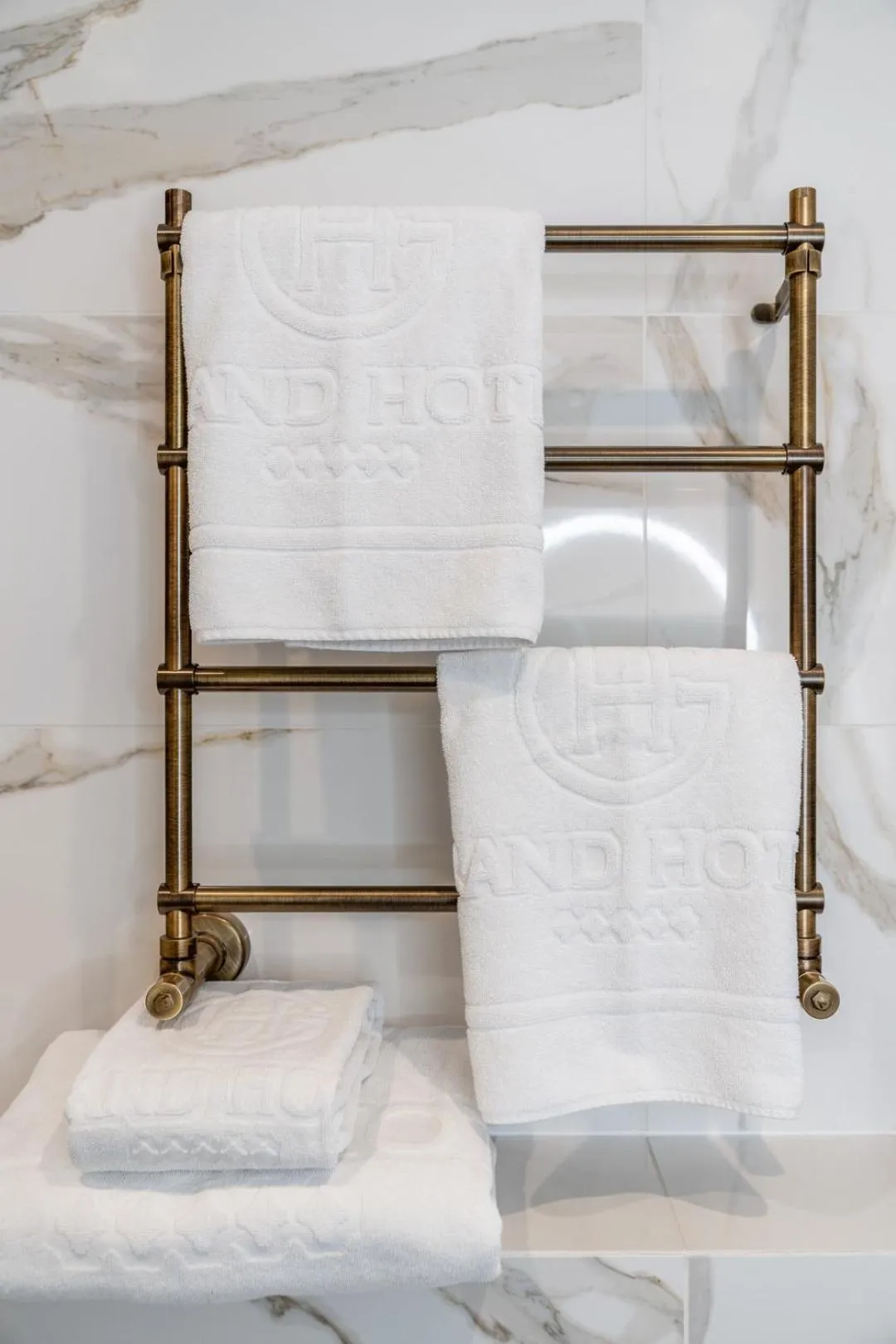 towels, Bed in Grand Hotel Lviv Casino & Spa