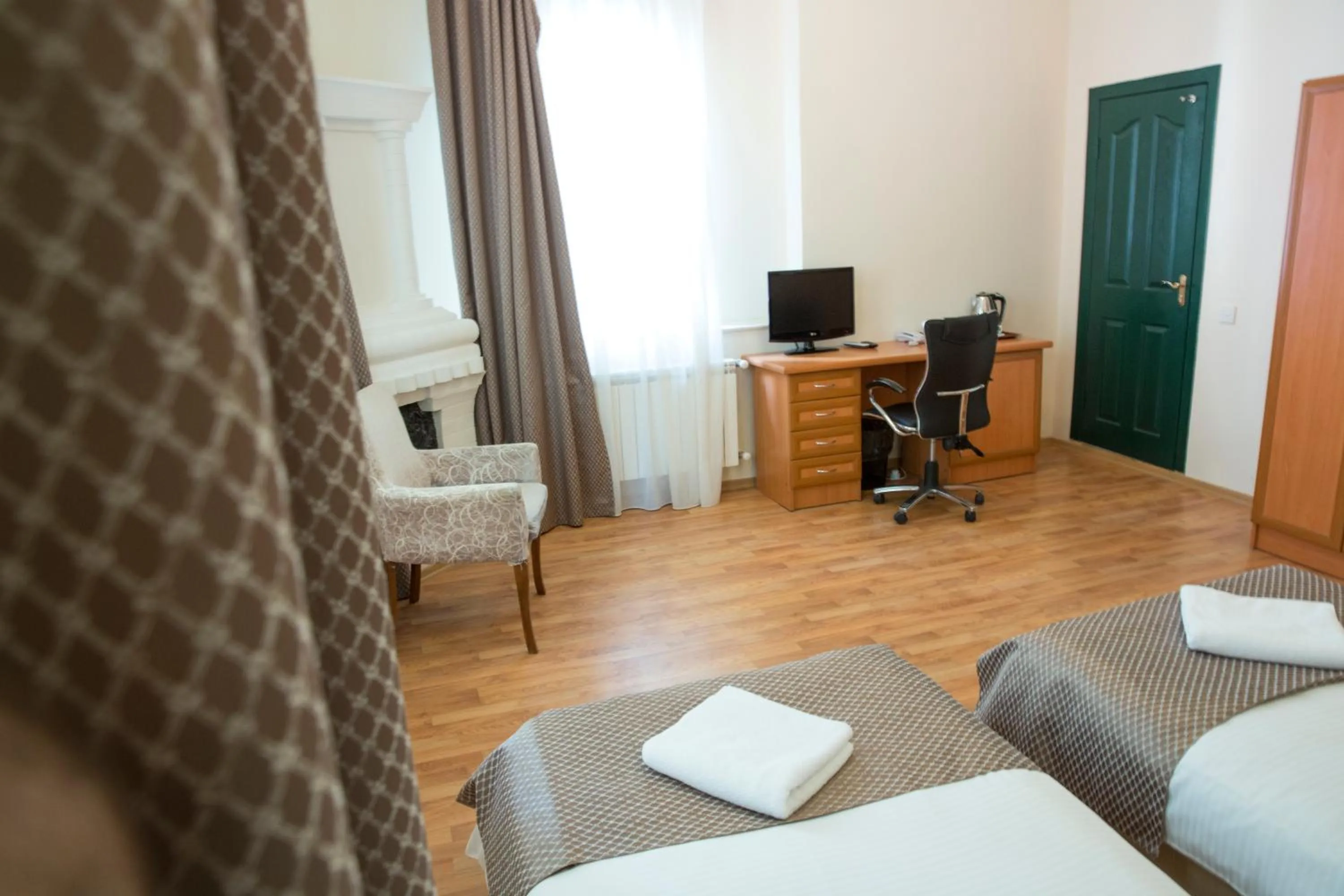 Bed in Old City Inn Hotel