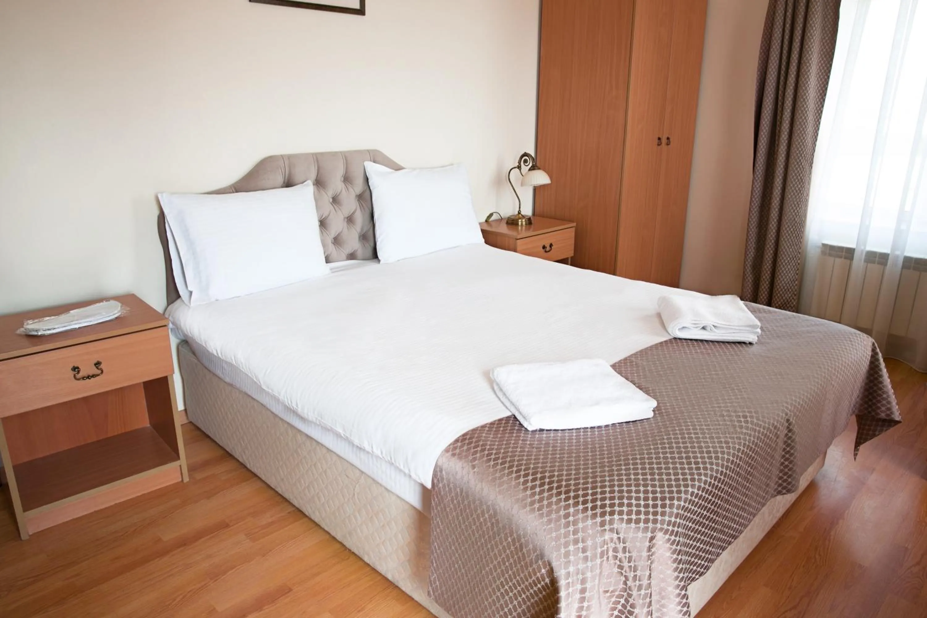 Bed in Old City Inn Hotel