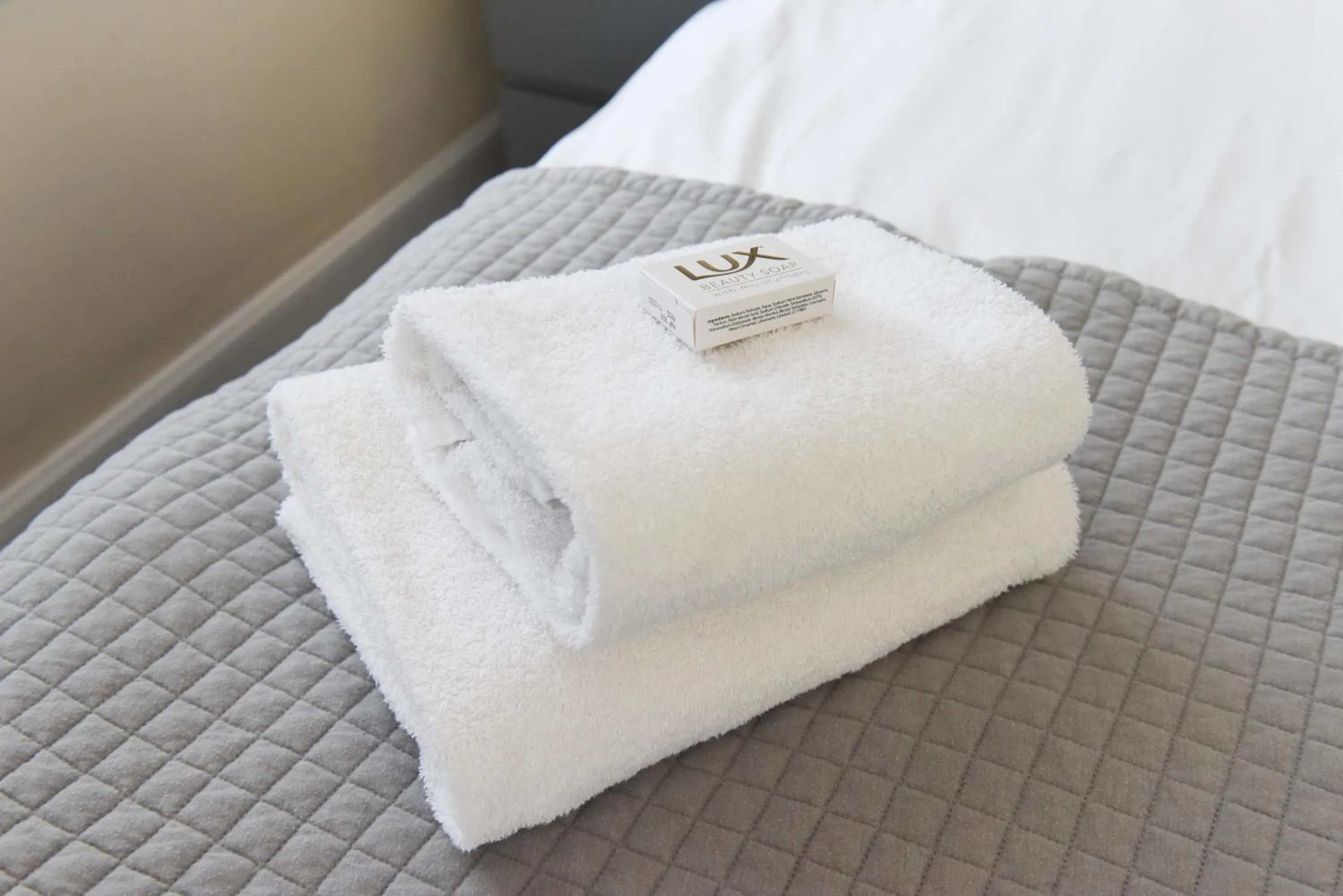 towels, Bed in Sandyford Hotel