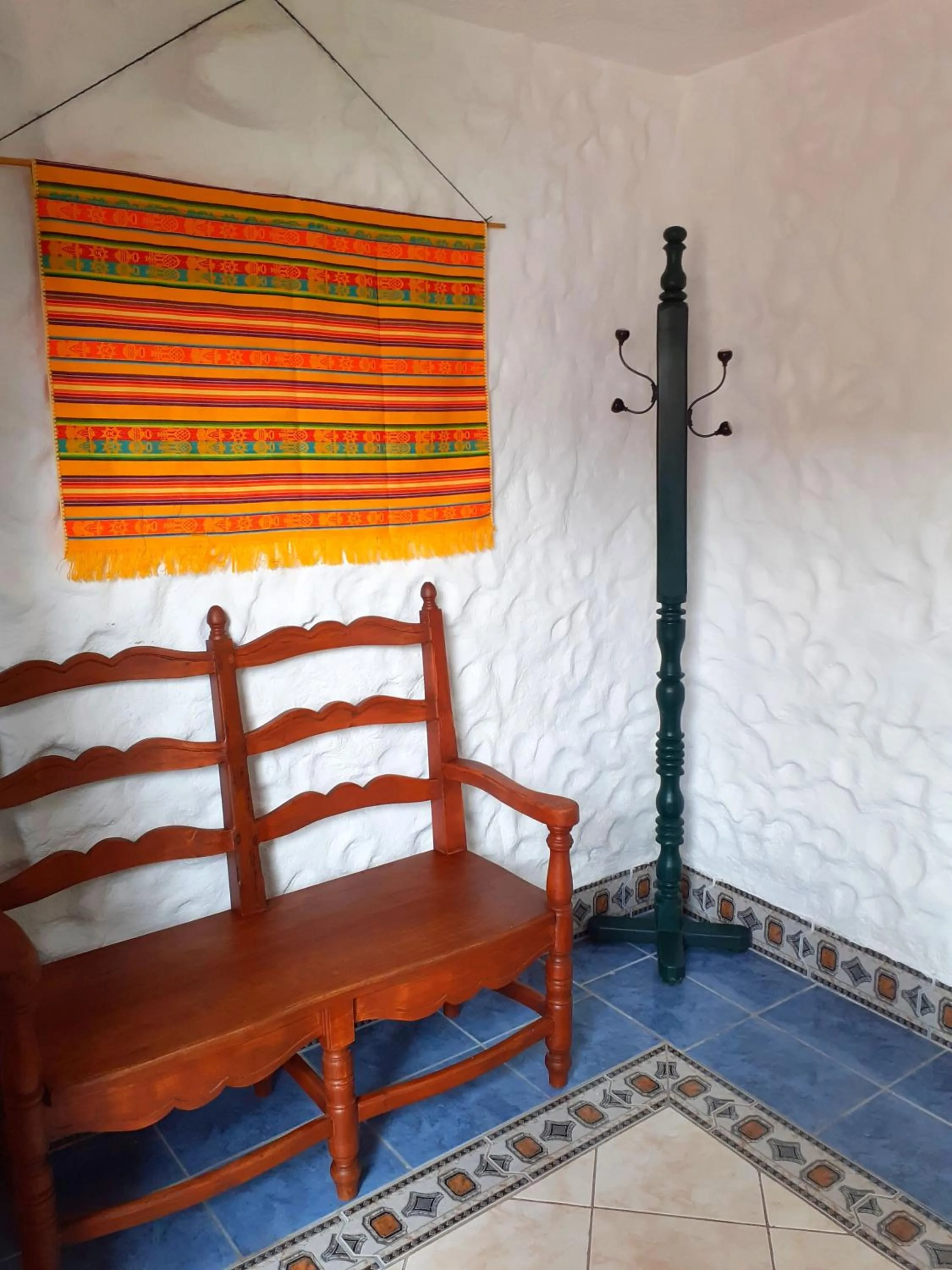 Seating area in CasKaffeSu Hotel and Restaurant Mindo