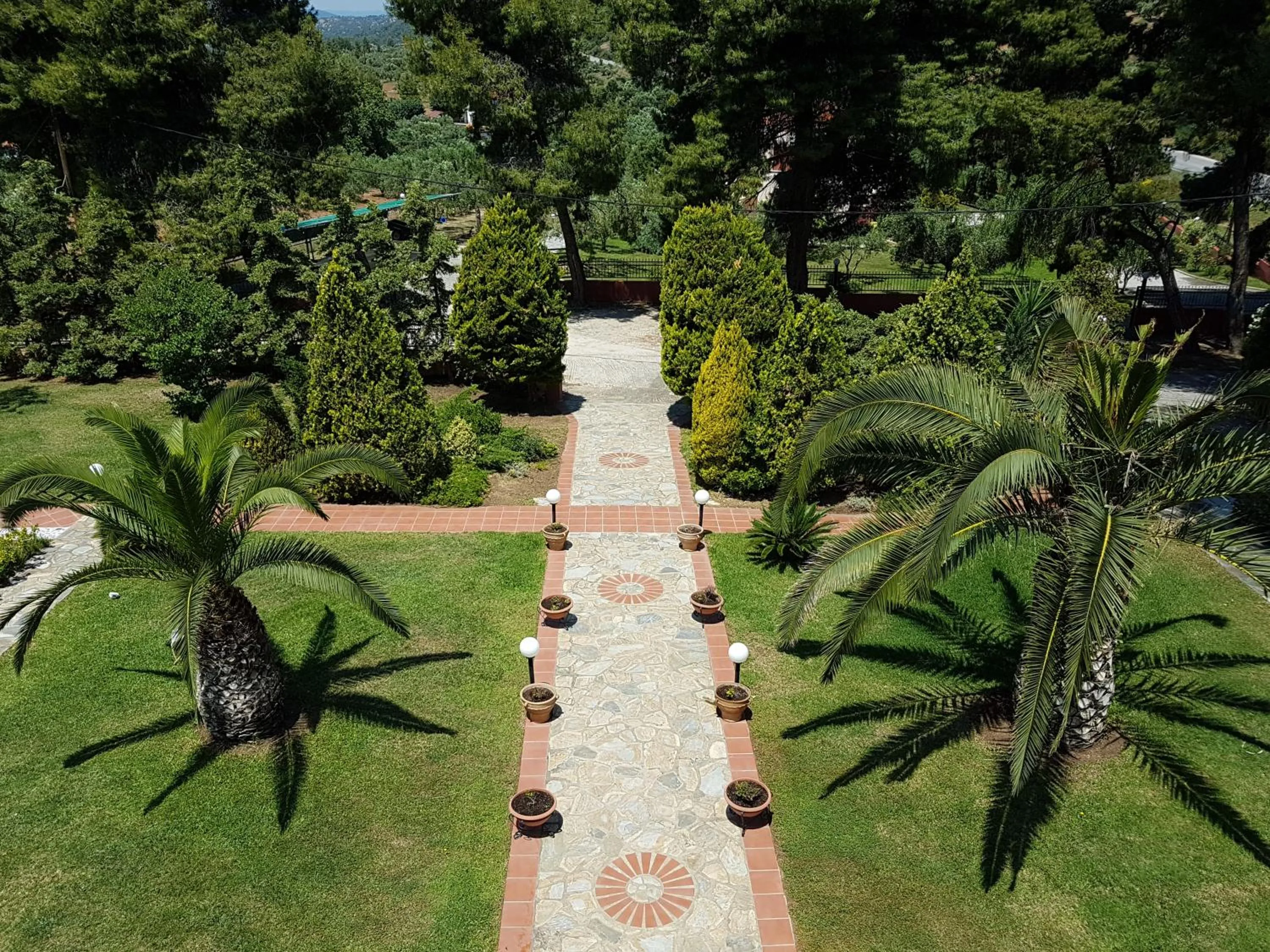 Garden in Agrili Apartments & Rooms