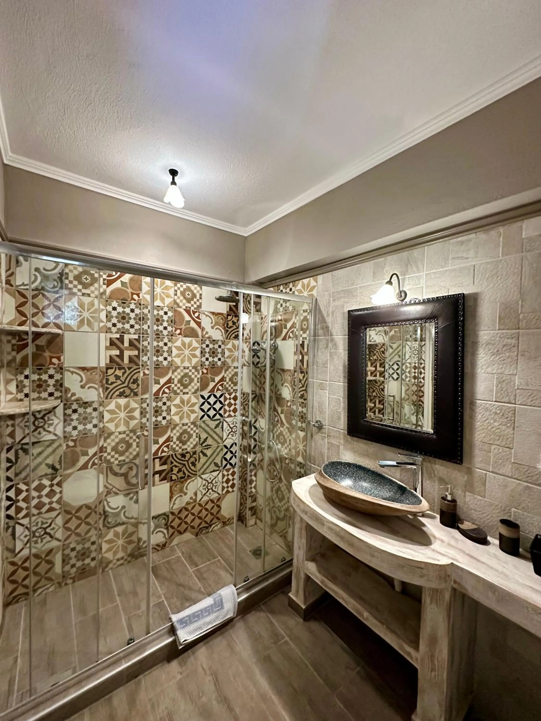 Shower in Agrili Apartments & Rooms