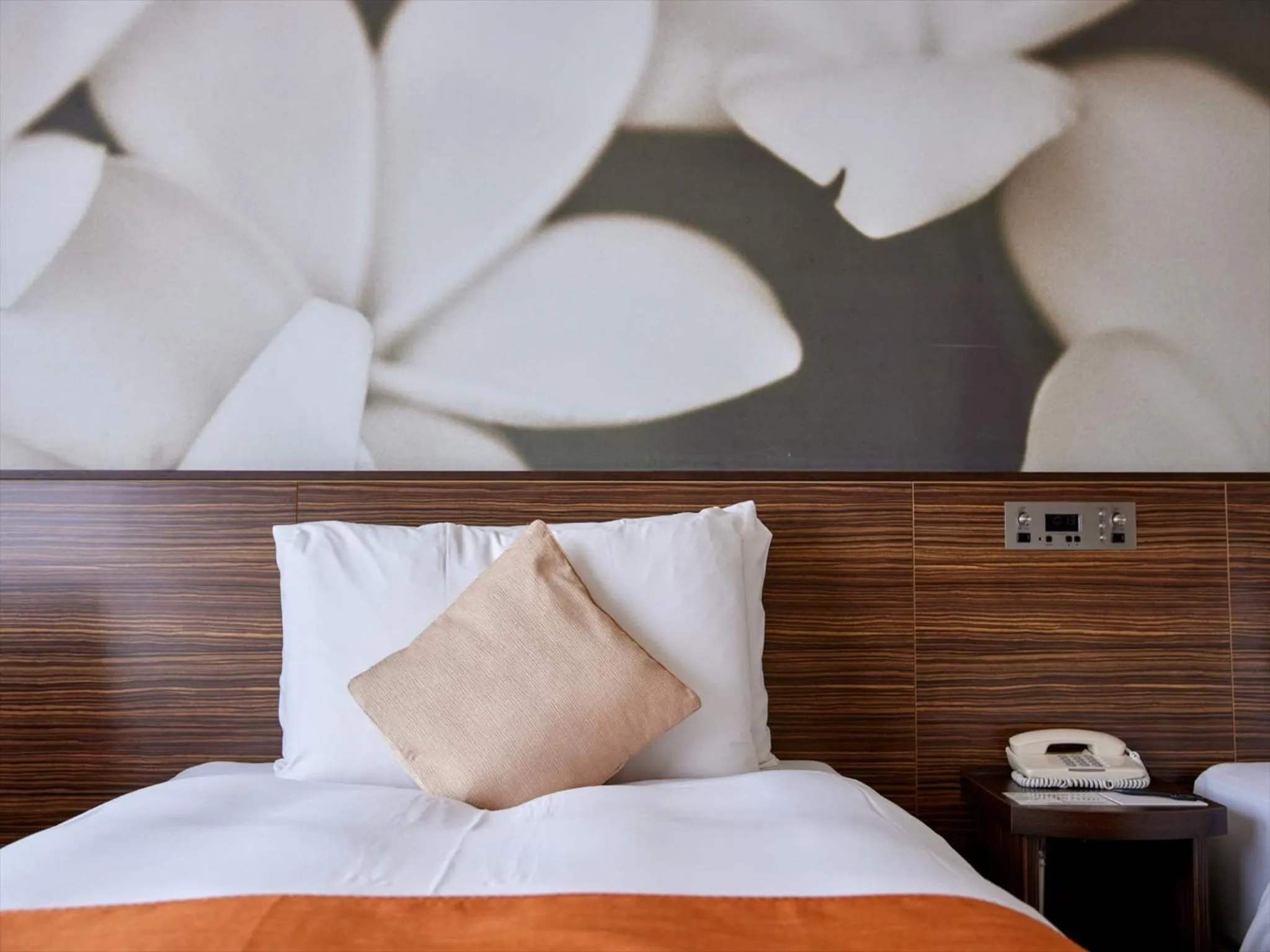 Bed in Okinawa NaHaNa Hotel & Spa