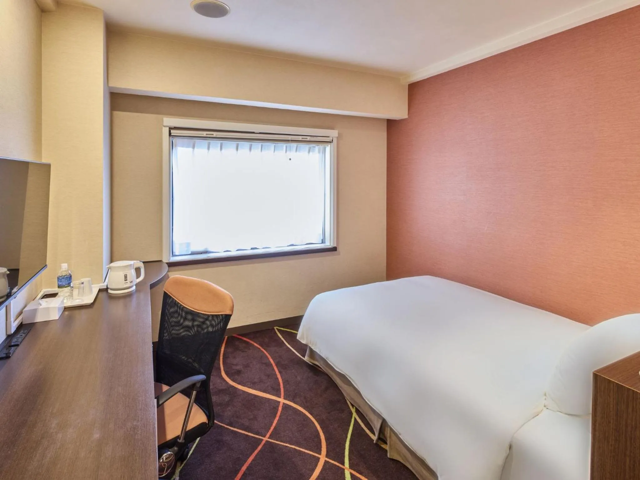 Bed in Okinawa NaHaNa Hotel & Spa