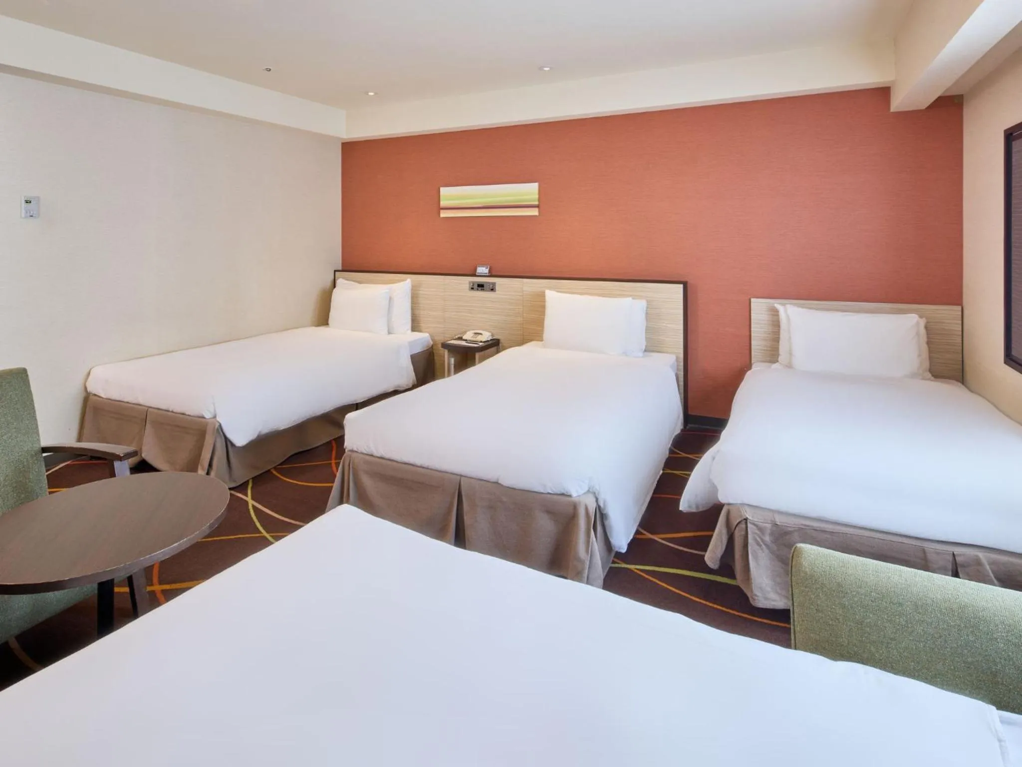 Bed in Okinawa NaHaNa Hotel & Spa