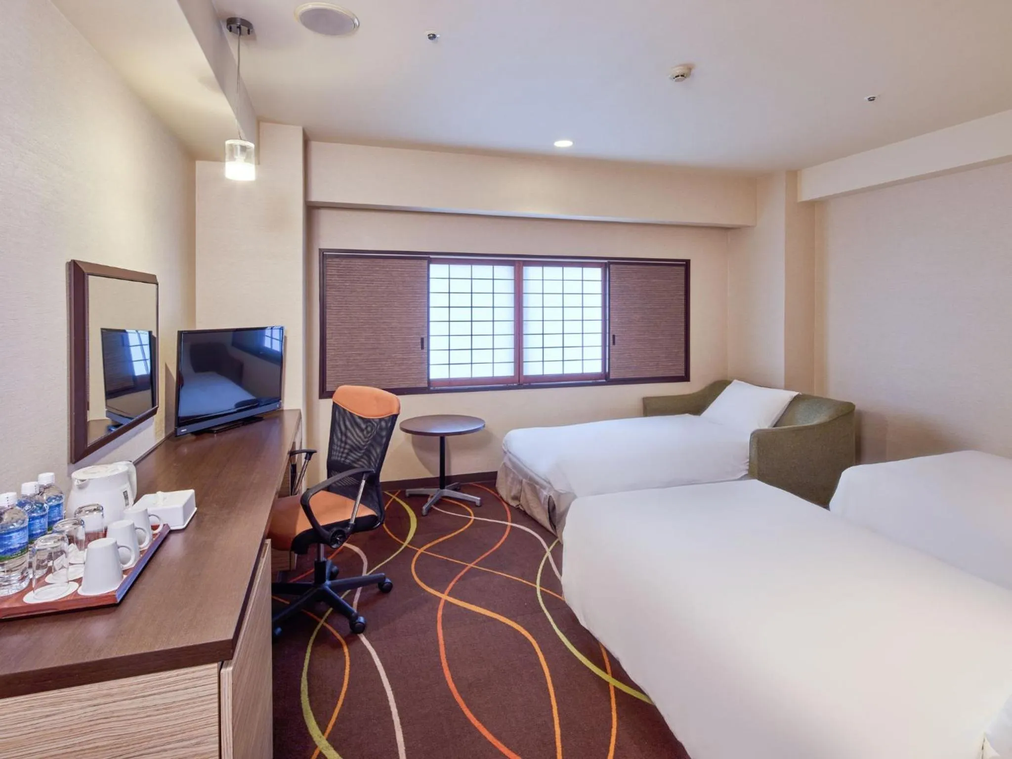 Bed in Okinawa NaHaNa Hotel & Spa