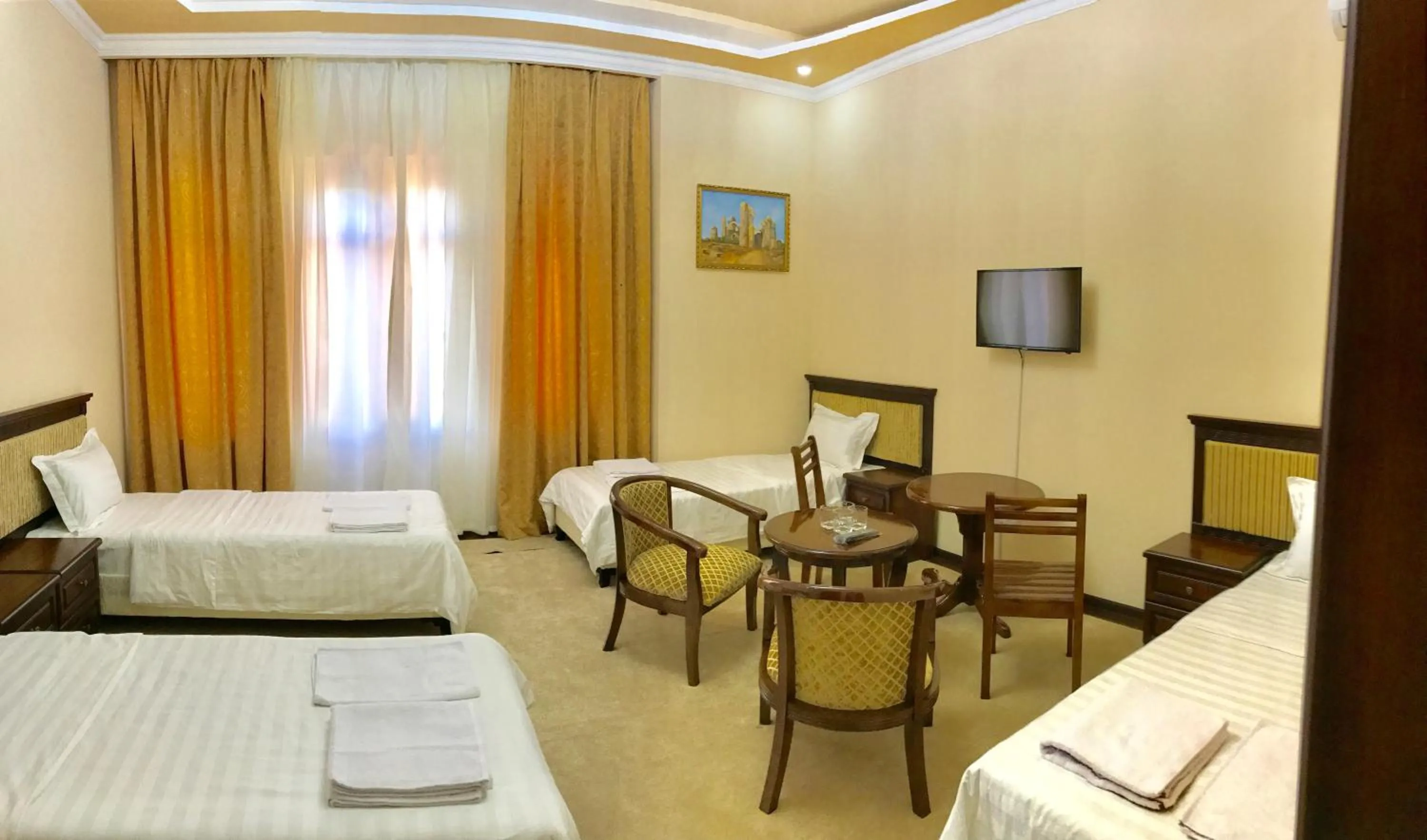 Bed in Muzaffar Hotel Samarkand