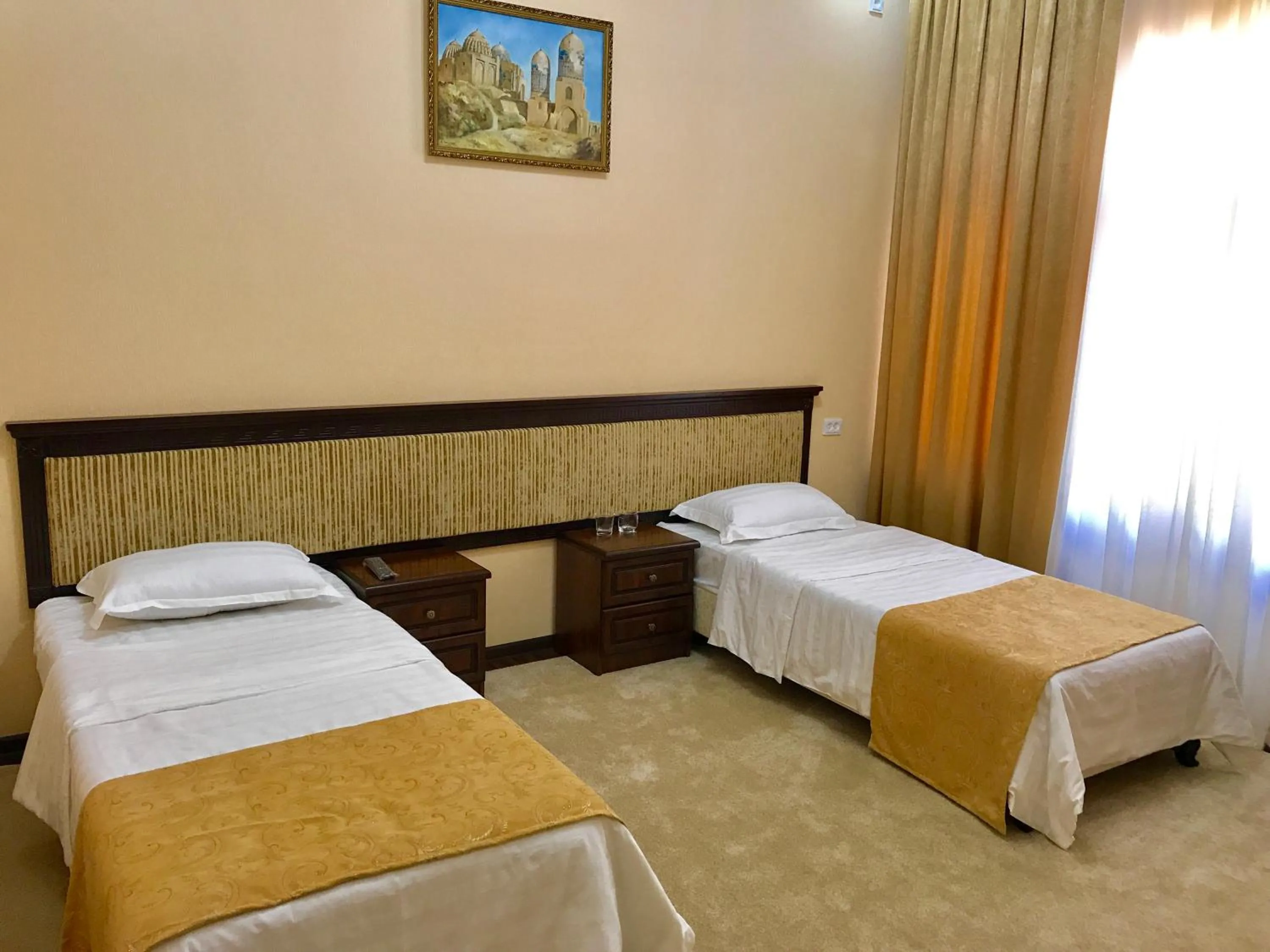 Bed in Muzaffar Hotel Samarkand