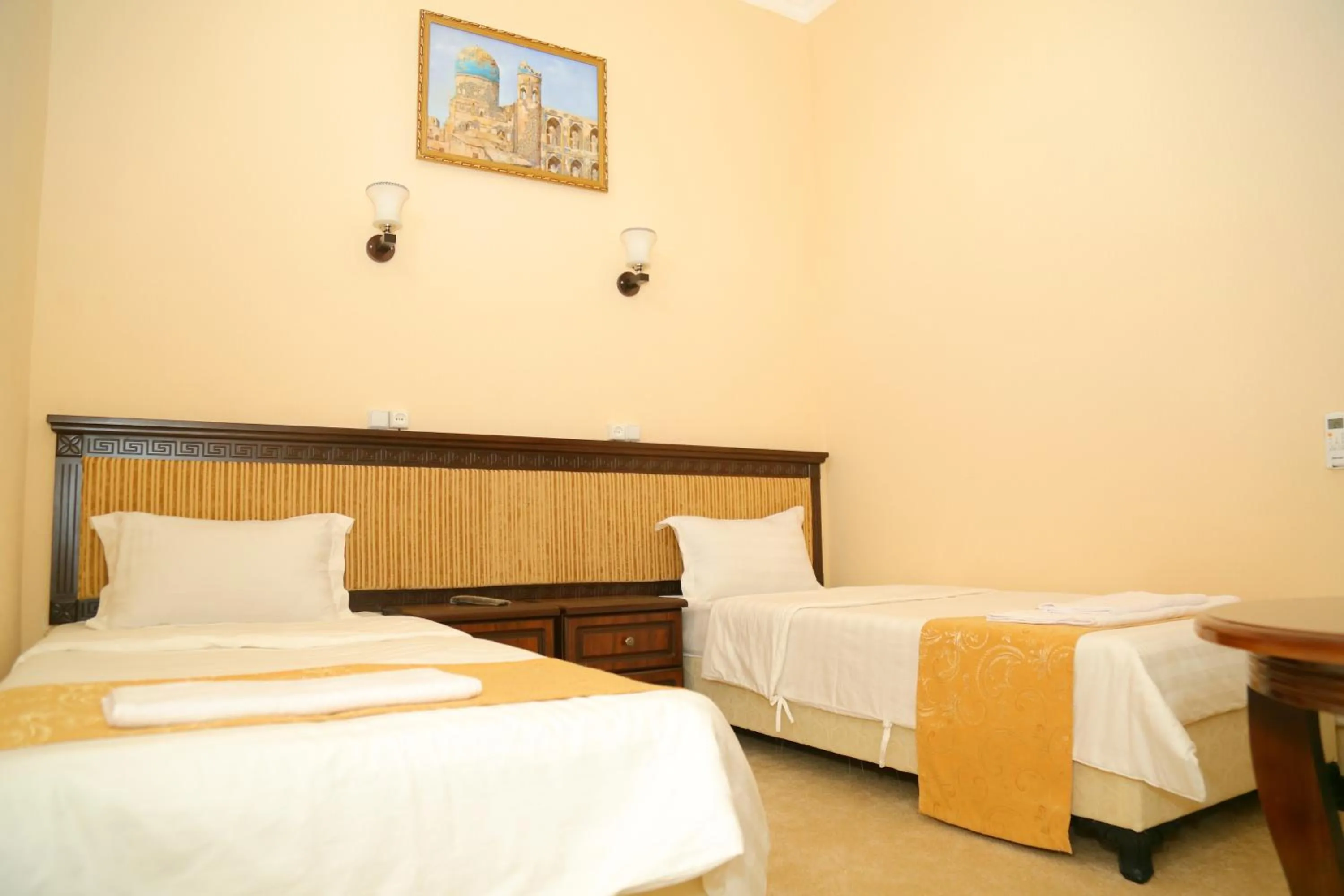 Bed in Muzaffar Hotel Samarkand