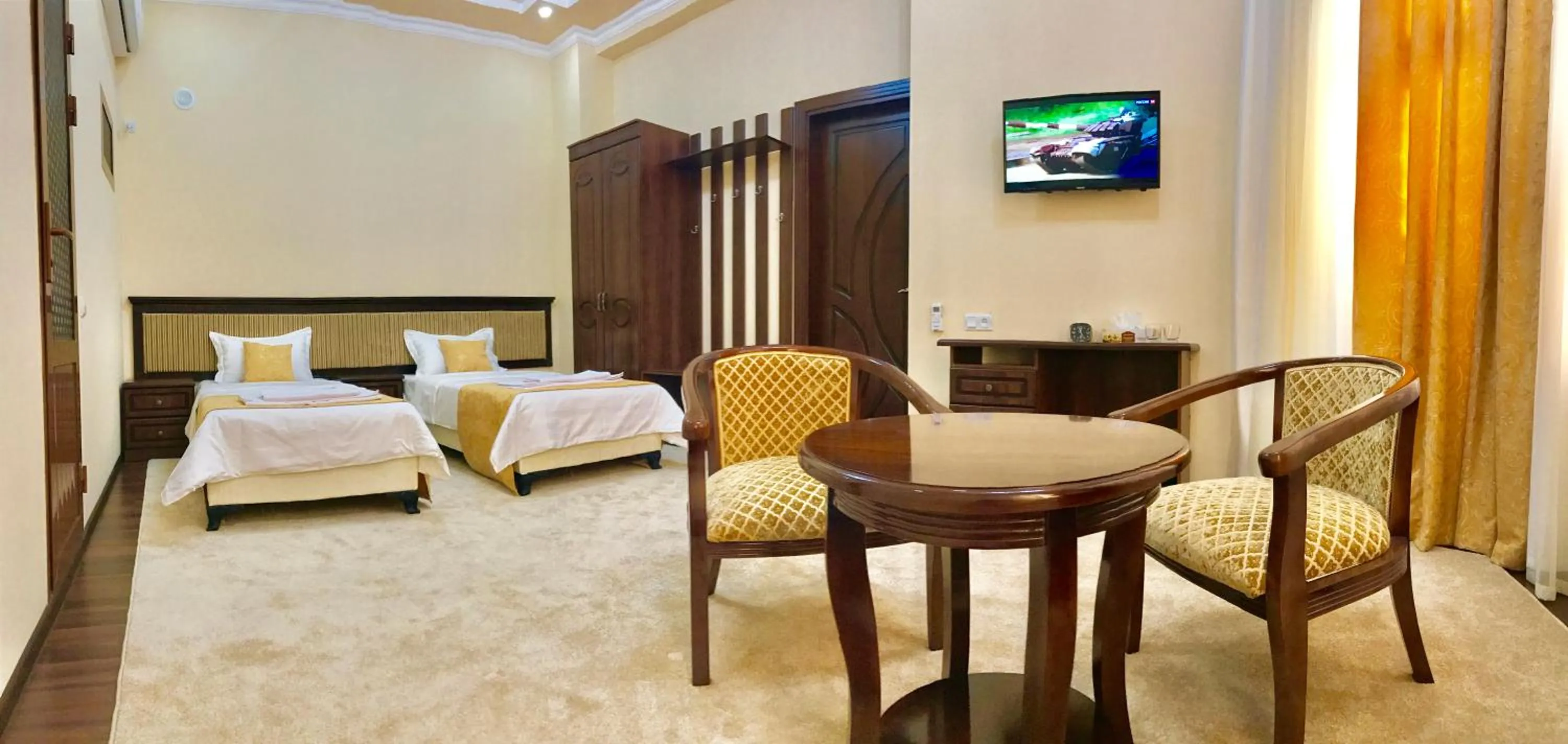 Bed in Muzaffar Hotel Samarkand