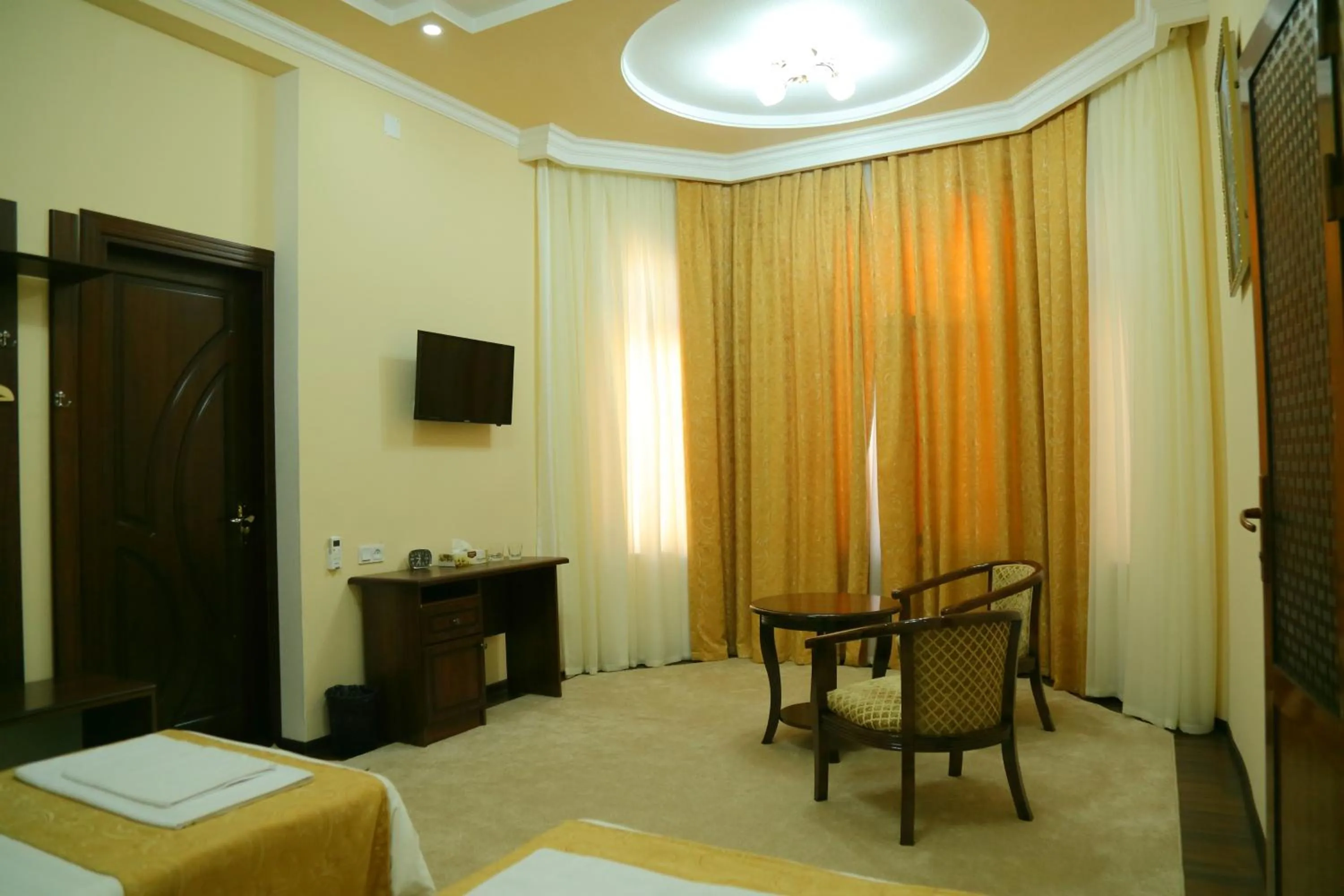 Bed in Muzaffar Hotel Samarkand