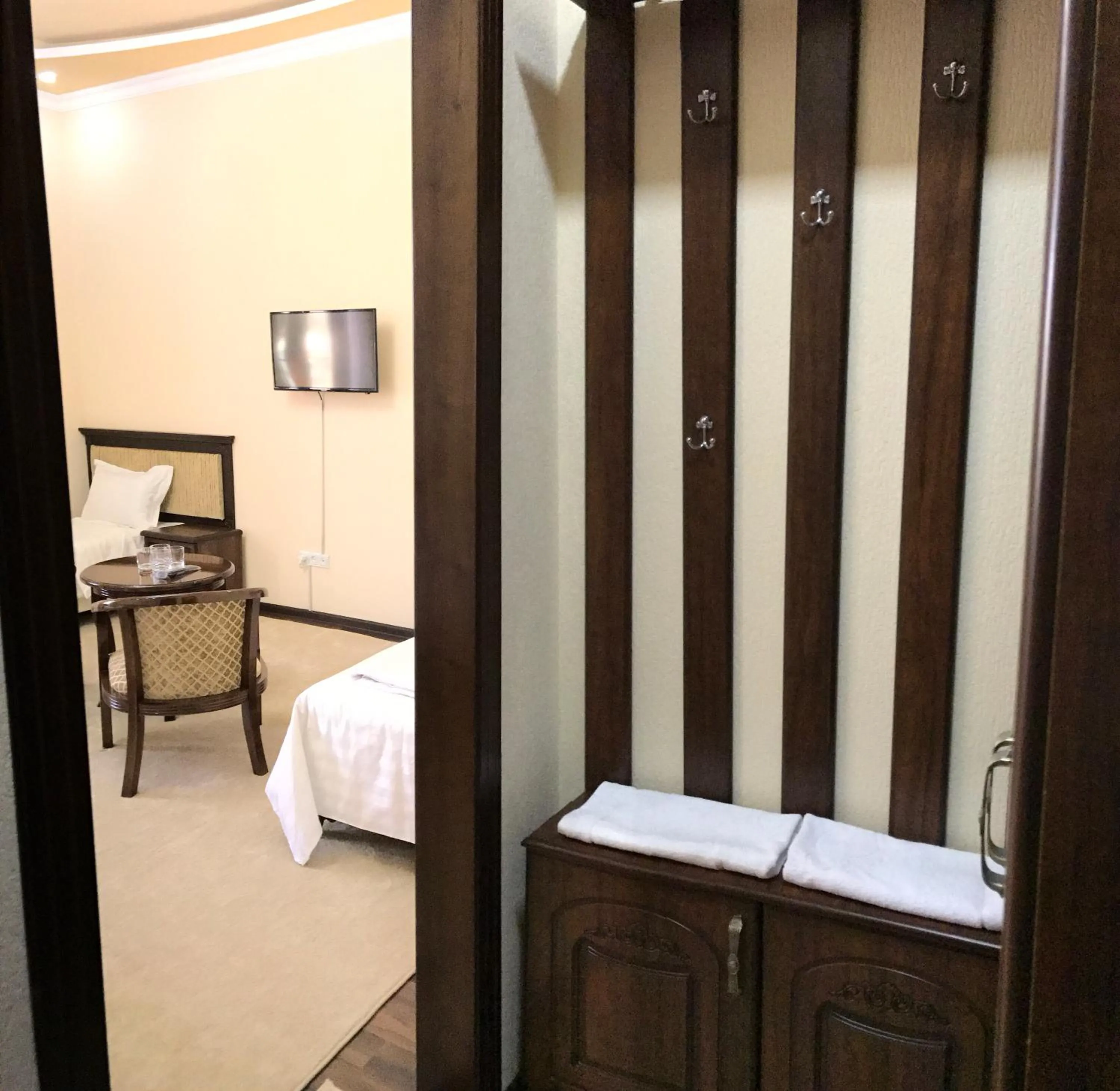 Bed in Muzaffar Hotel Samarkand