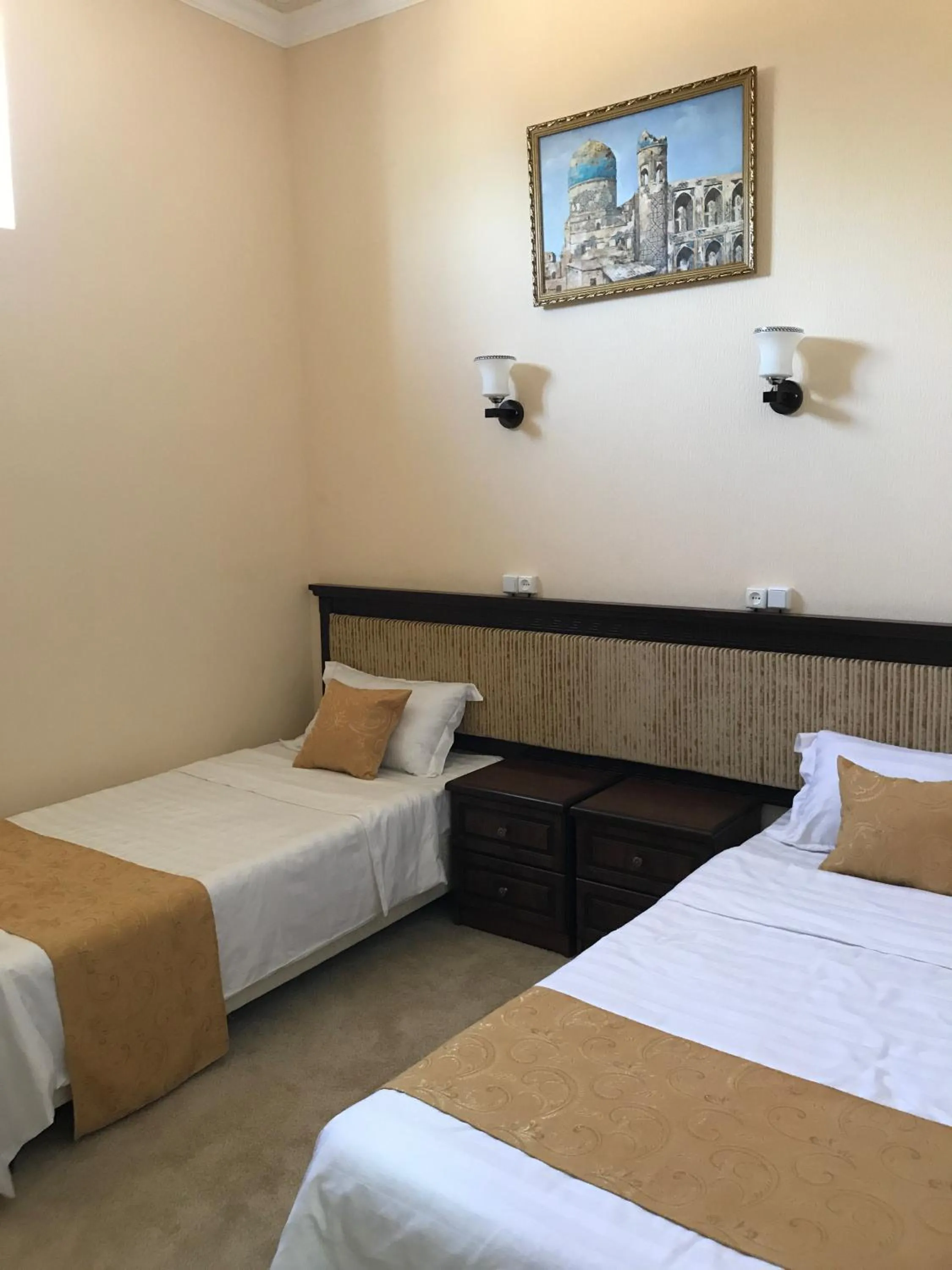 Bed in Muzaffar Hotel Samarkand