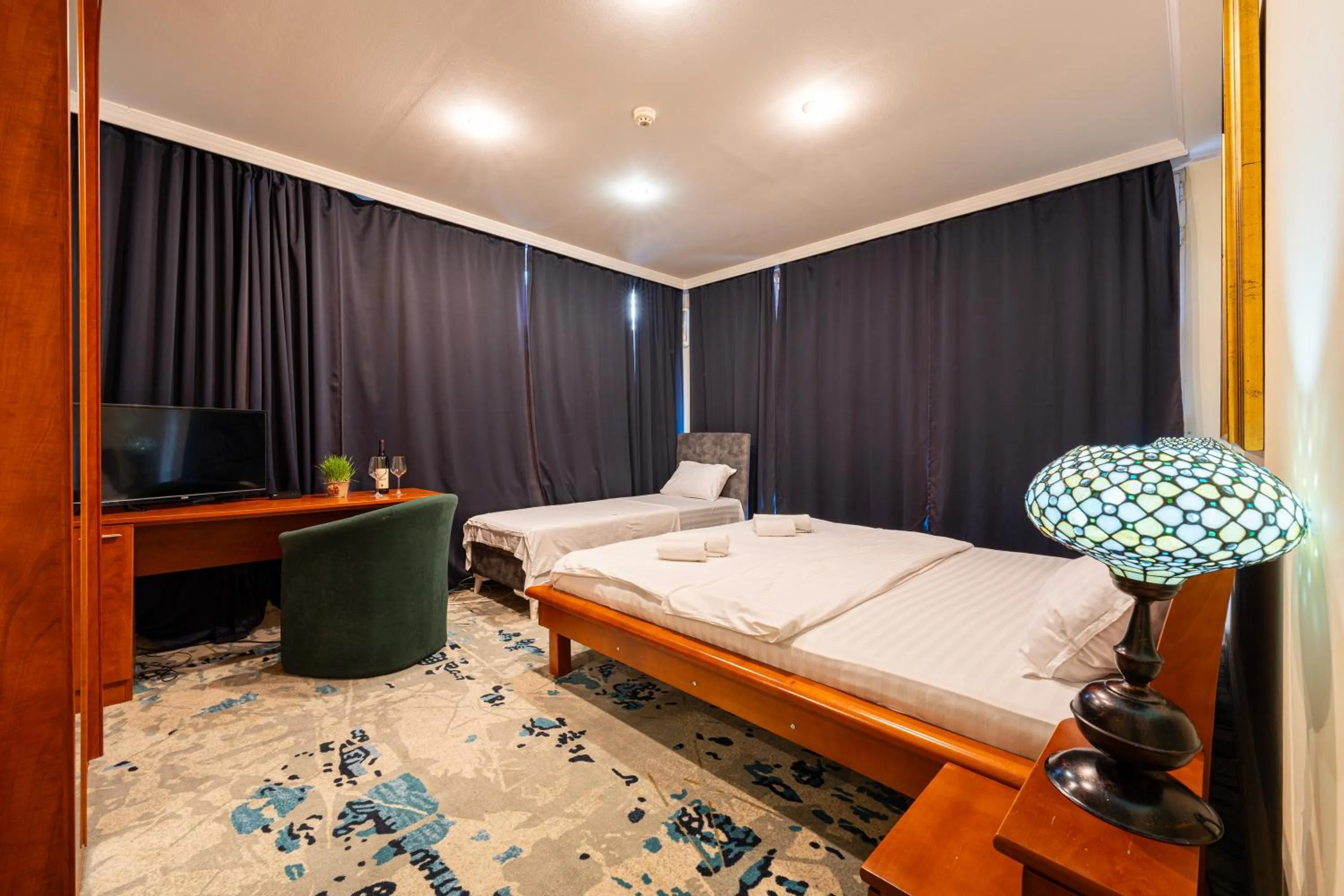 Bed in Hotel Bojatours