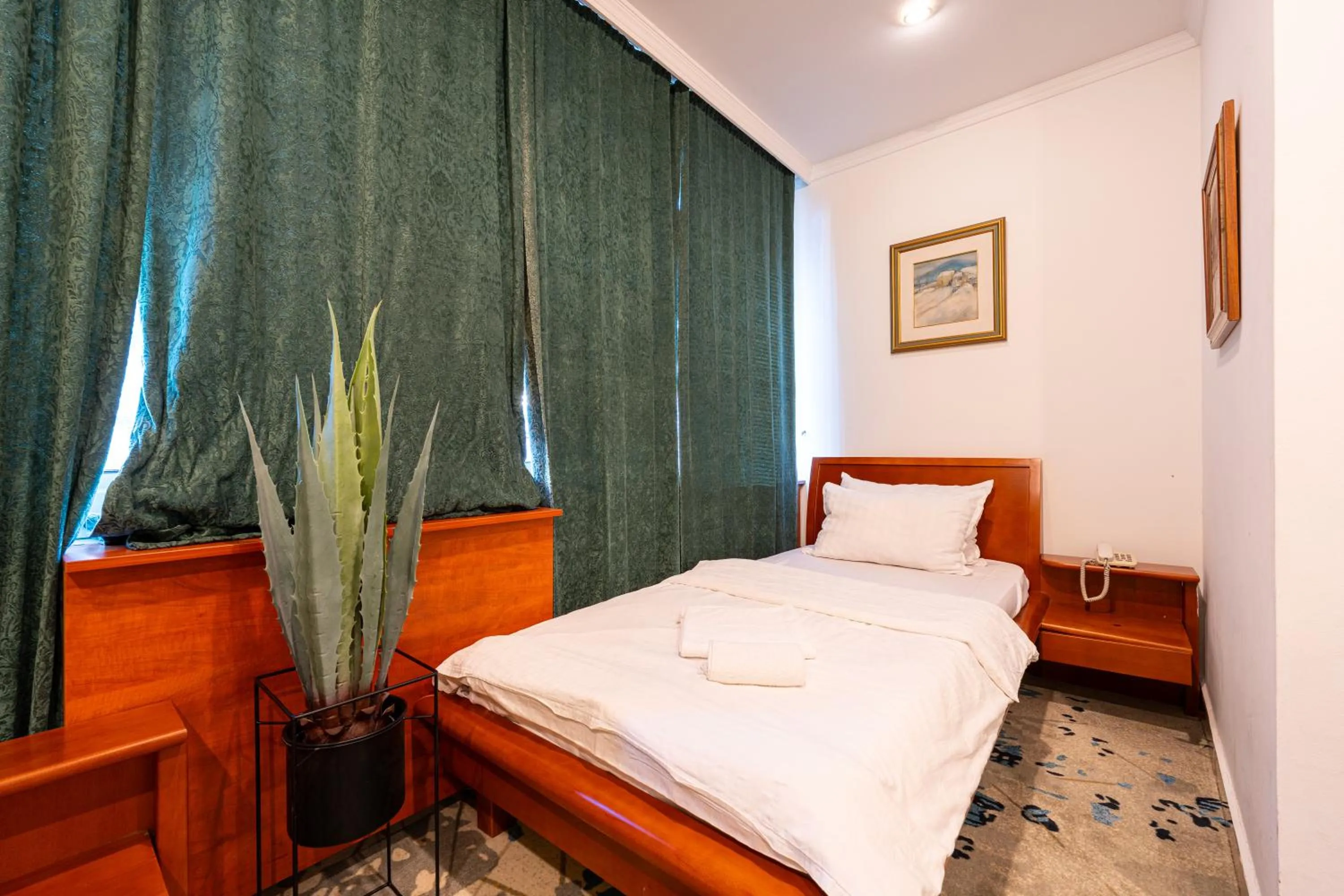 Bed in Hotel Bojatours