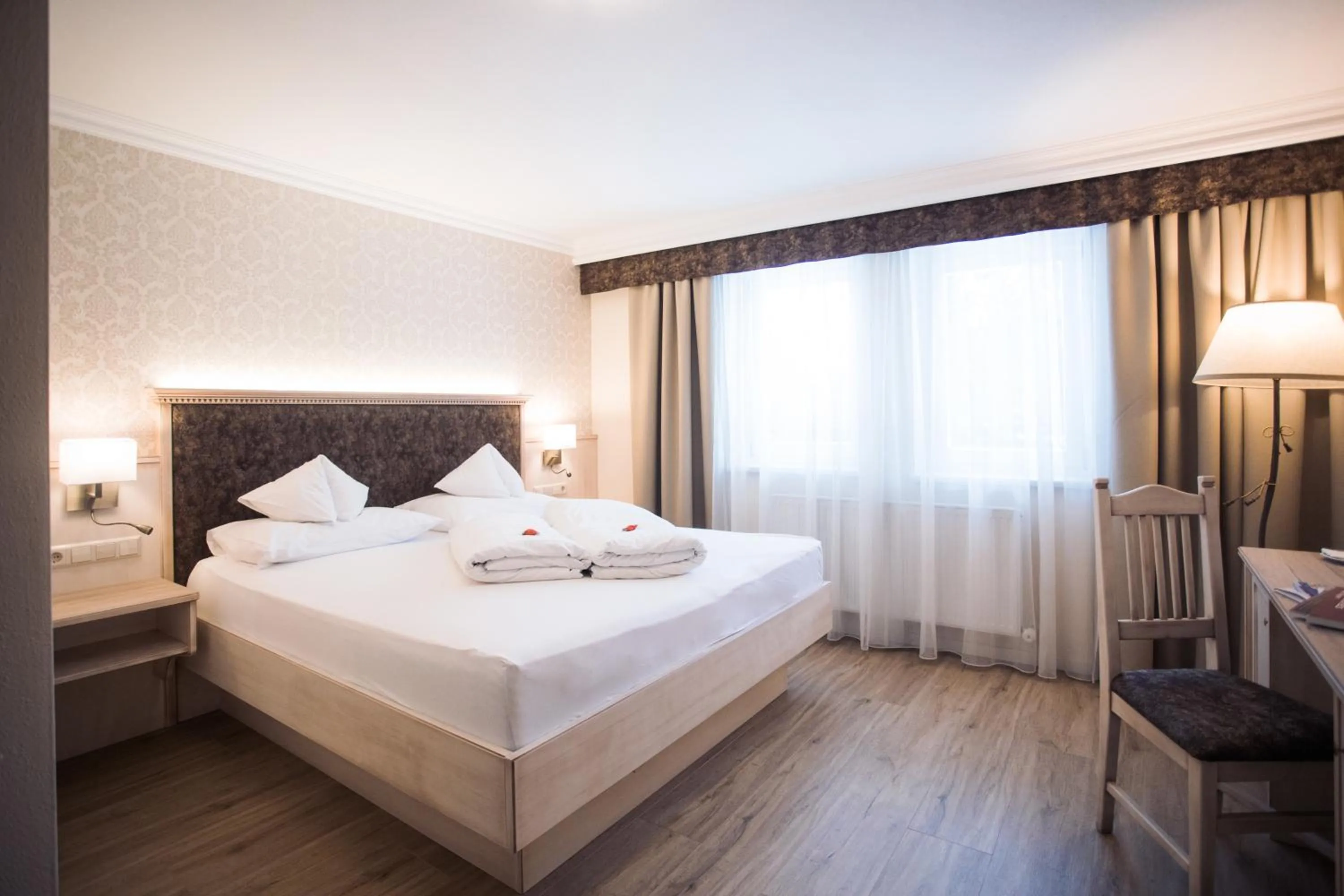 Bed in Schlosshotel Seewirt